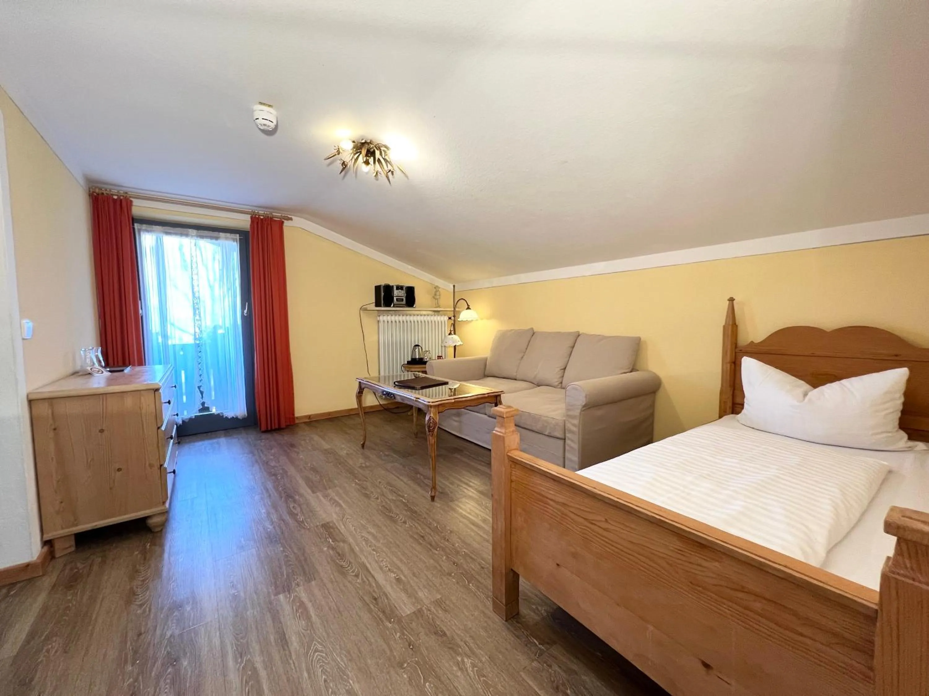 Bed in Hotel Bärenstüberl