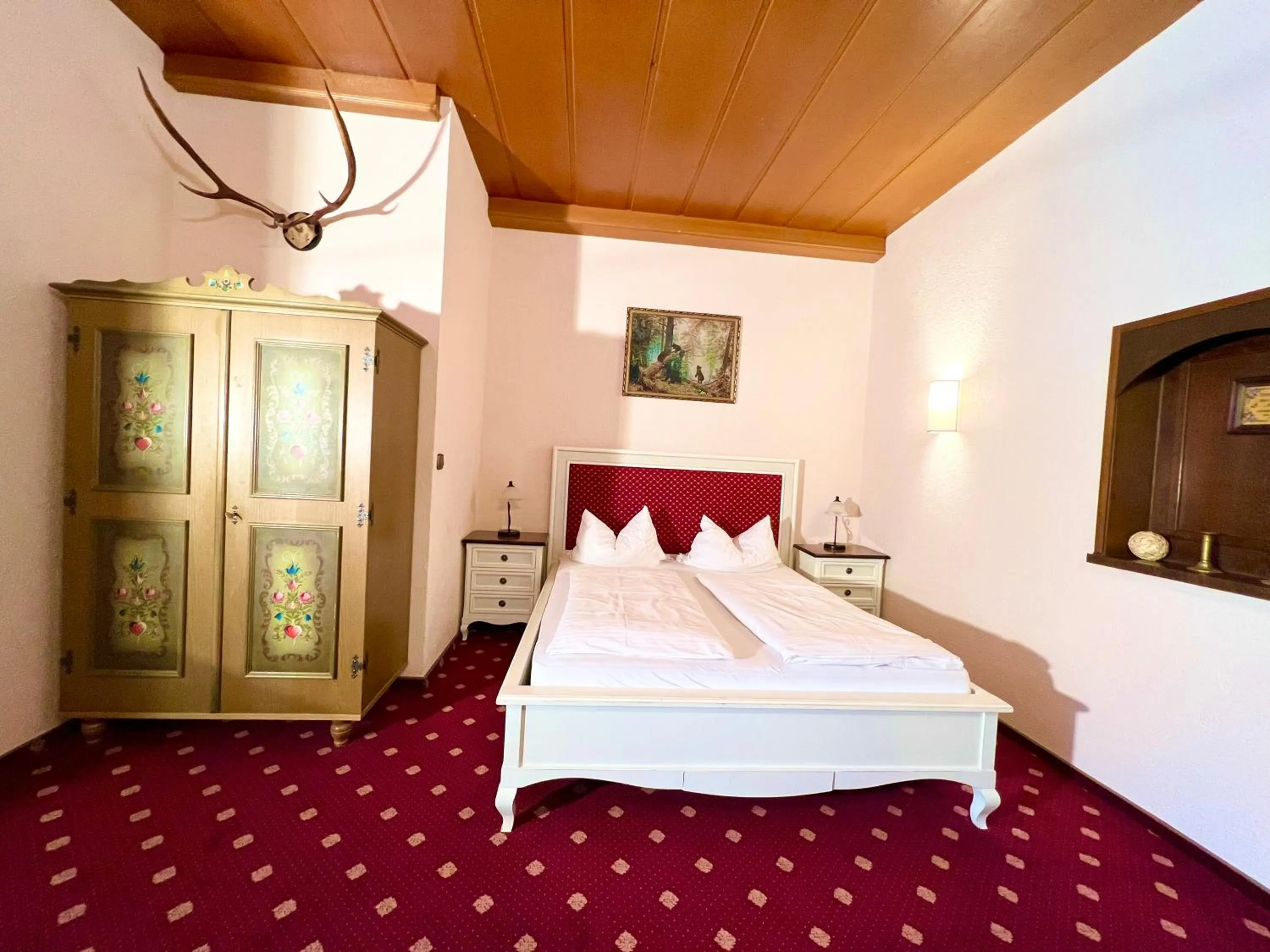 Bed in Hotel Bärenstüberl