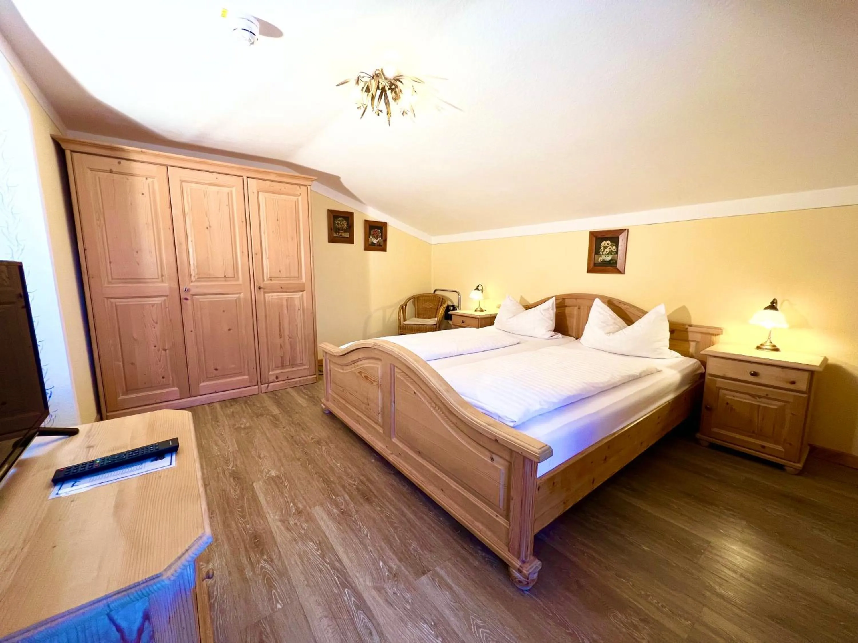 Bed in Hotel Bärenstüberl