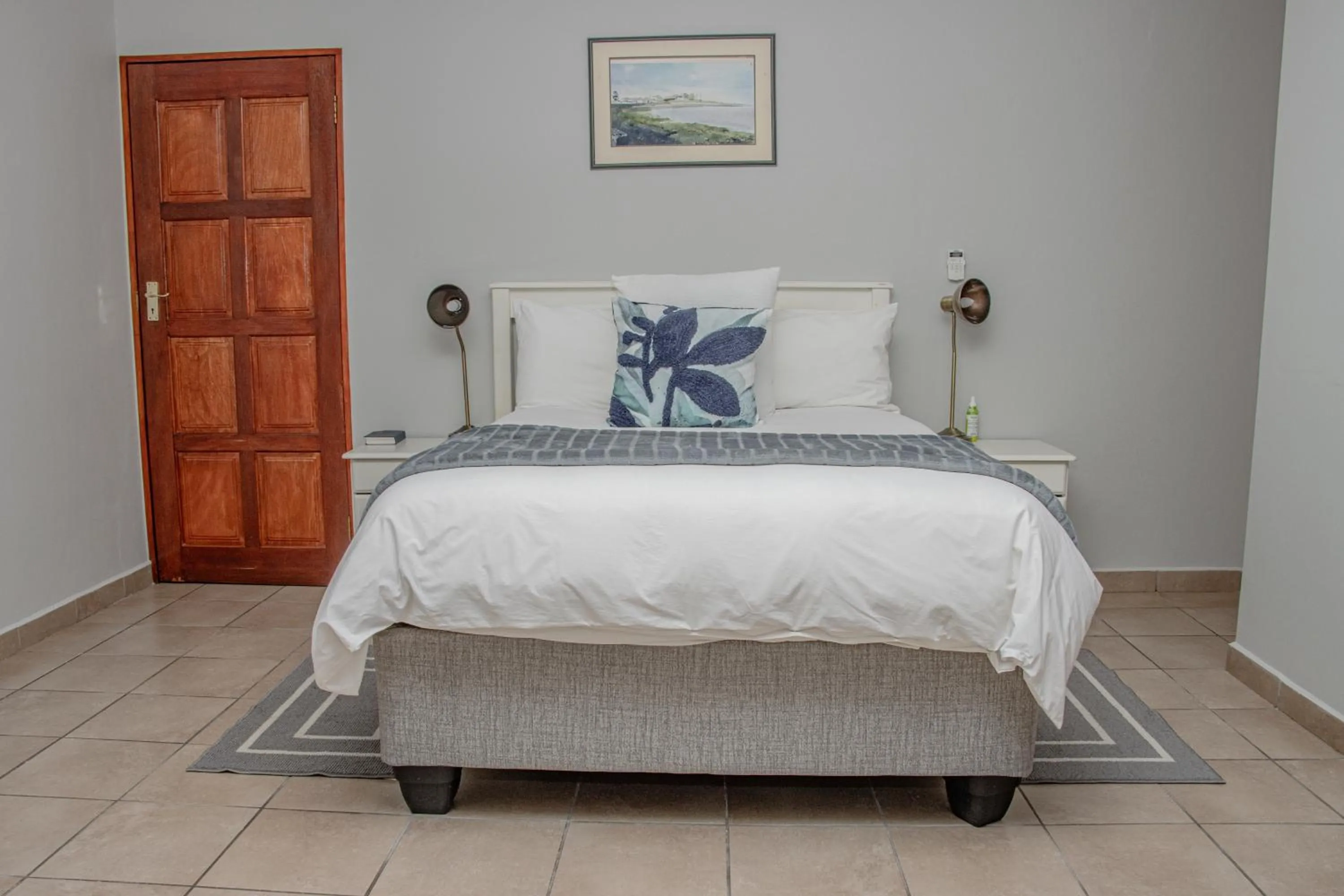 Bed in Woodpecker's Inn Guest House