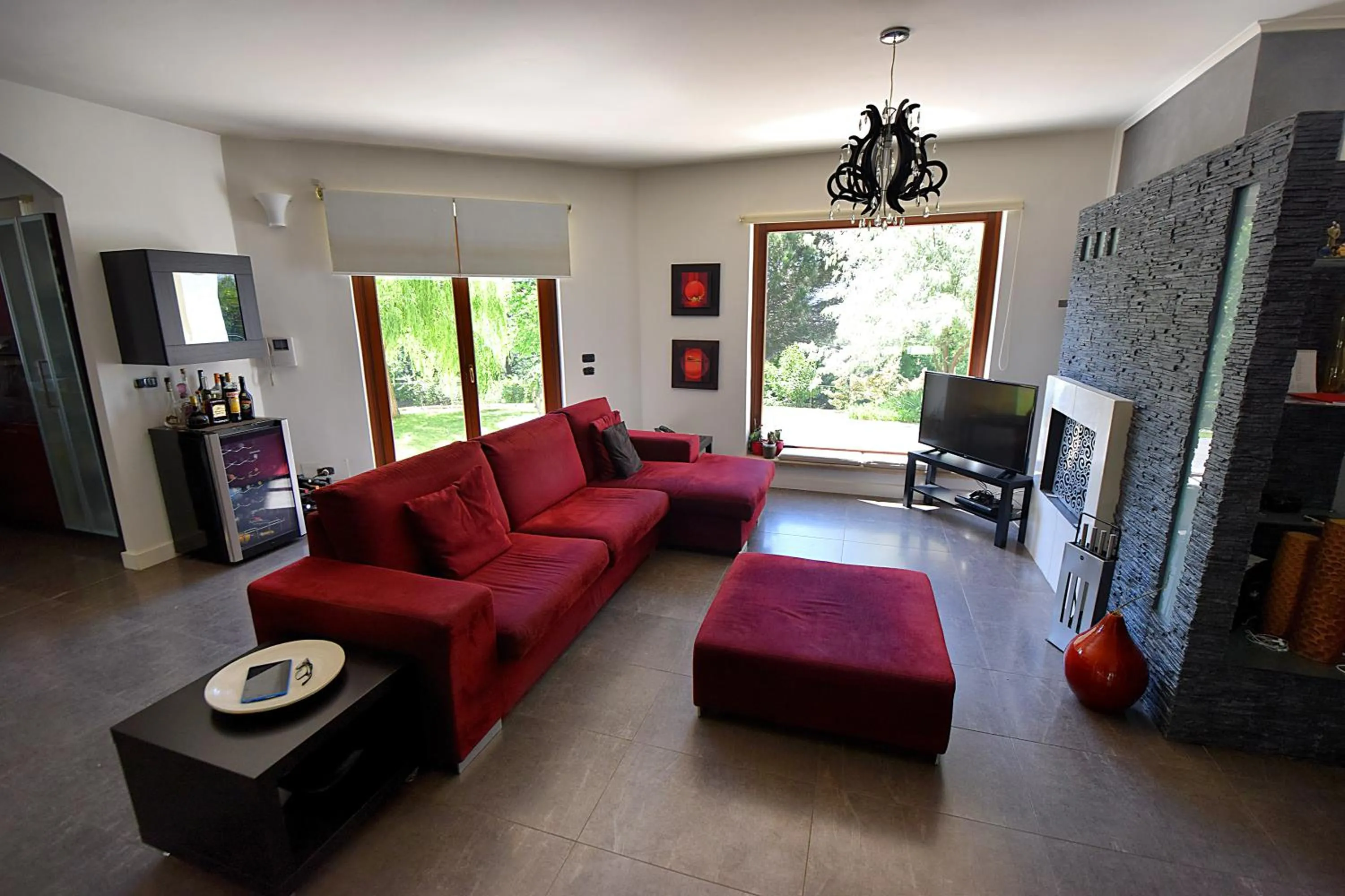 Communal lounge/ TV room in Villa La Mattina