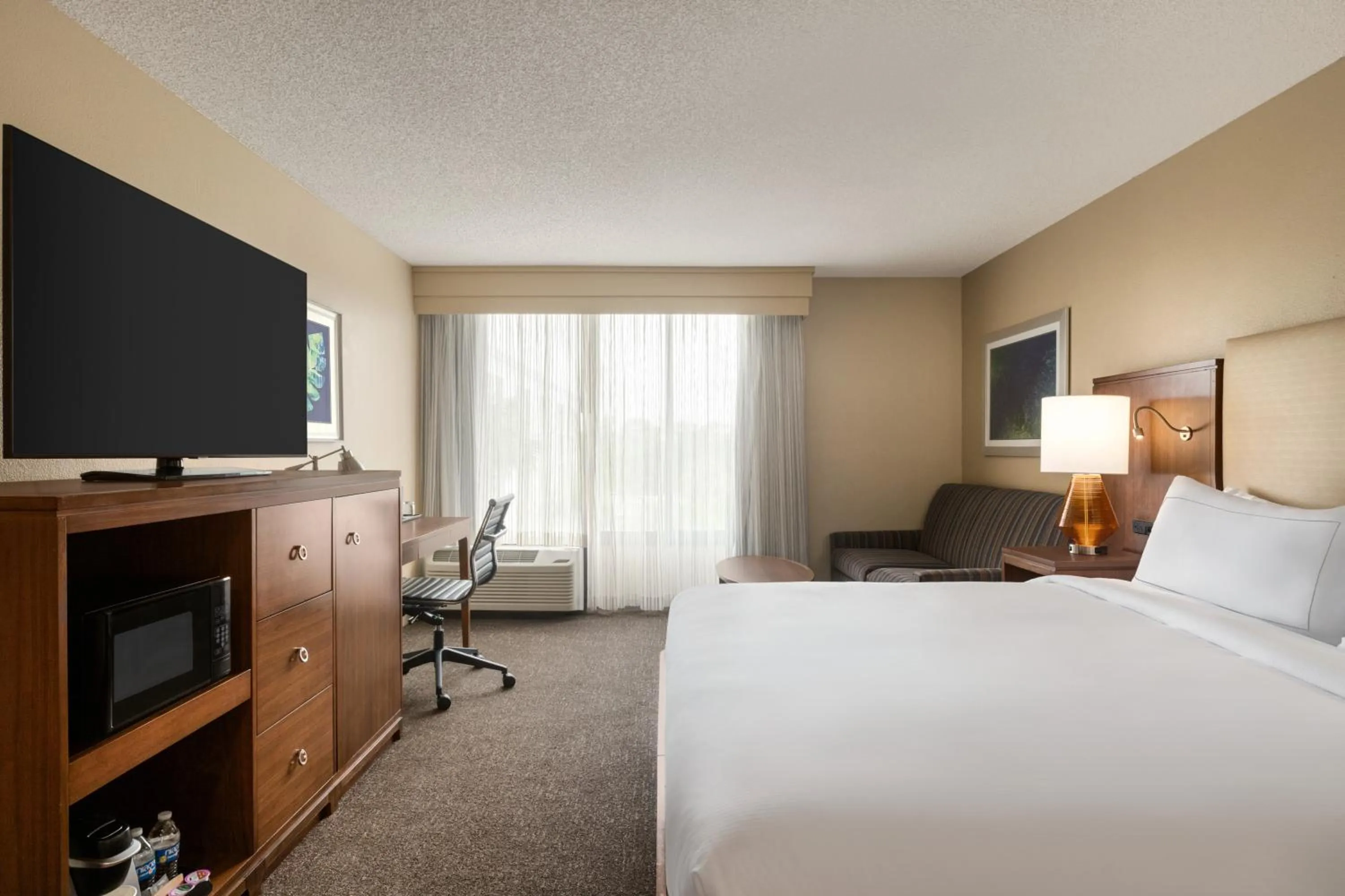 Bedroom, Bed in Doubletree by Hilton Fort Myers at Bell Tower Shops