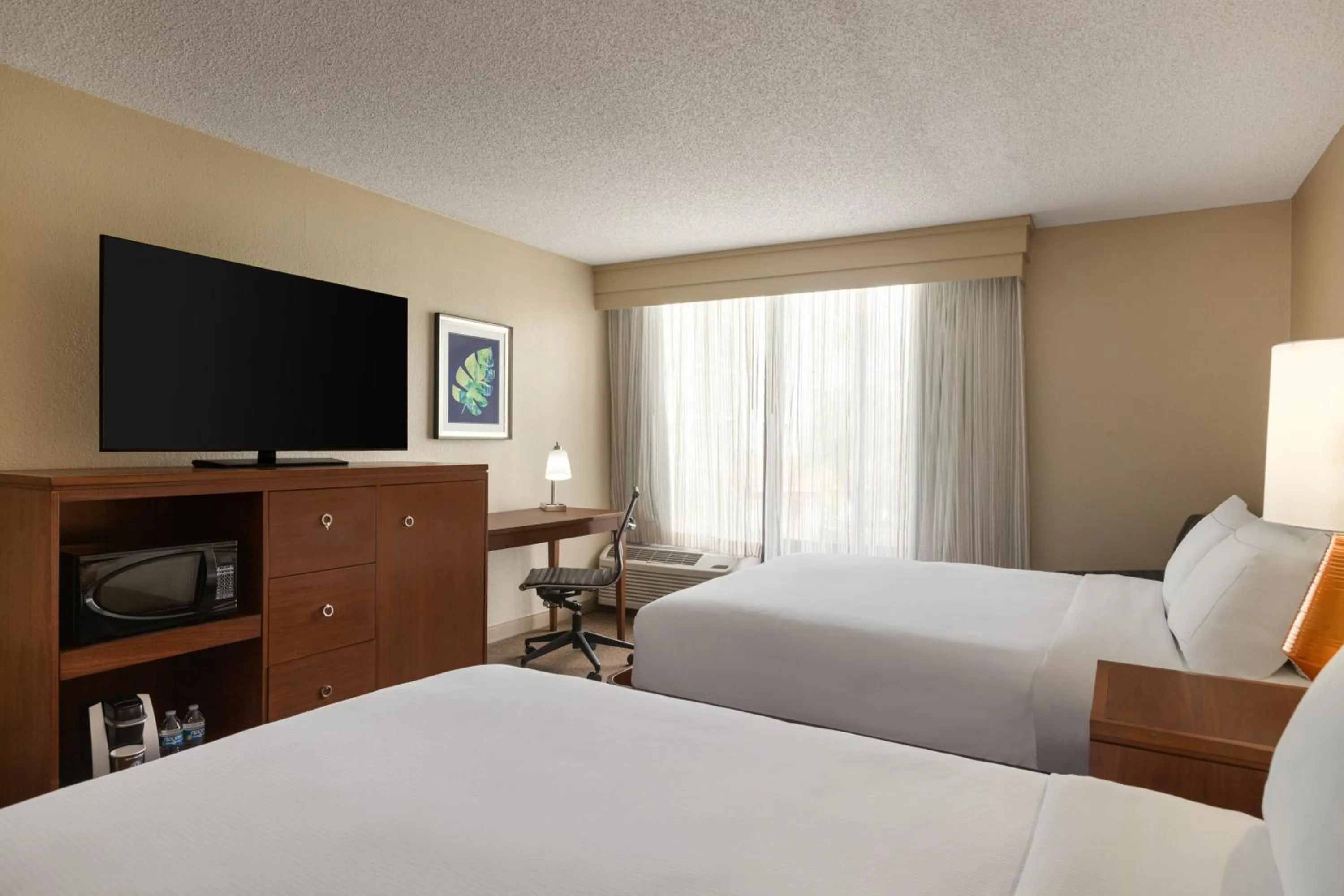 Bedroom, Bed in Doubletree by Hilton Fort Myers at Bell Tower Shops