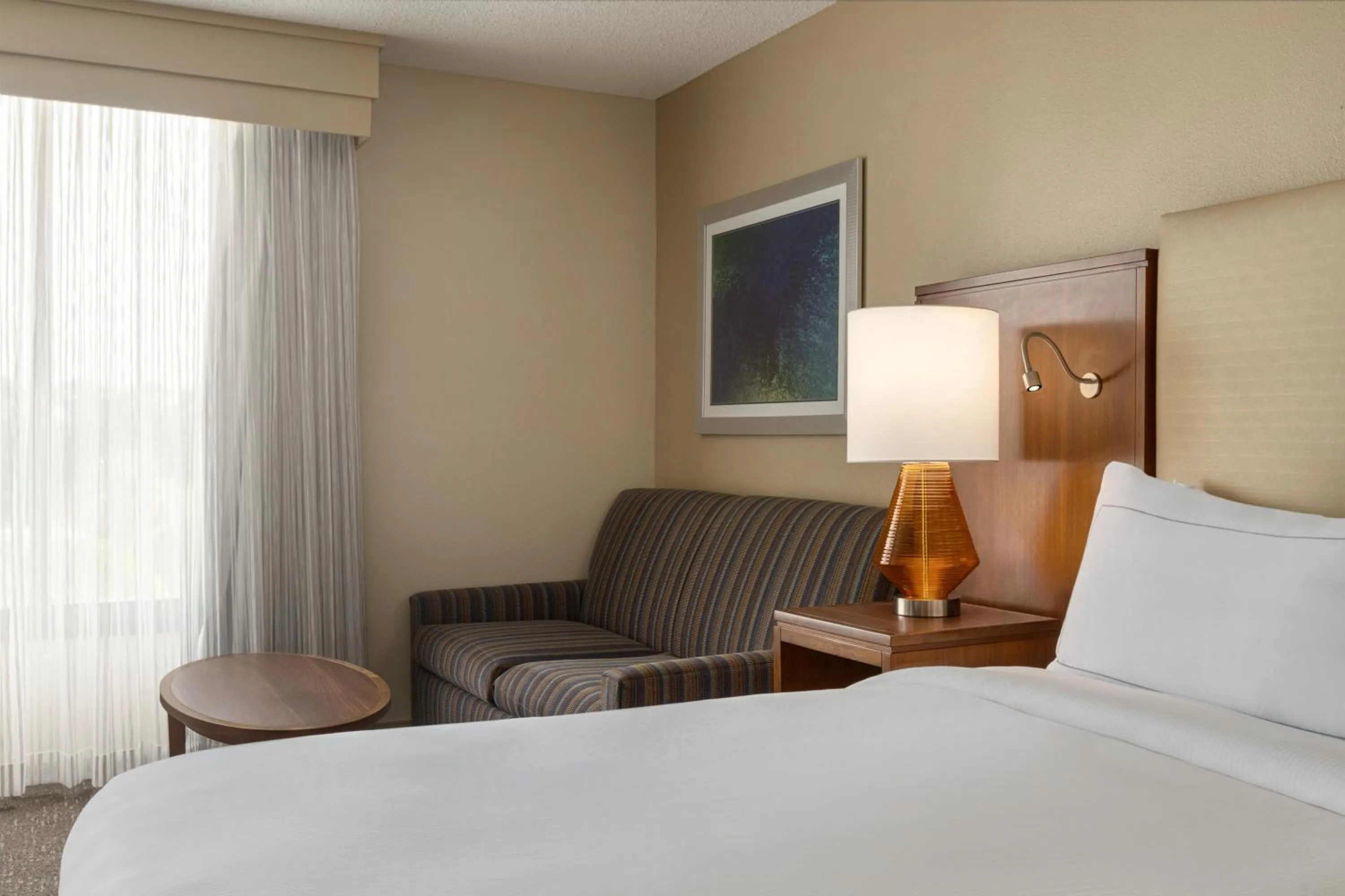 Bedroom, Bed in Doubletree by Hilton Fort Myers at Bell Tower Shops