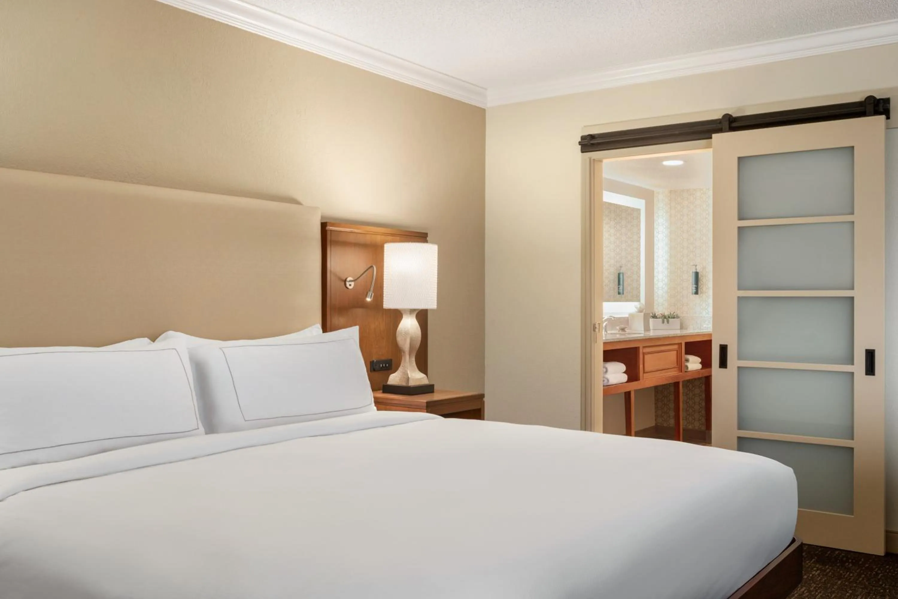 Bedroom, Bed in Doubletree by Hilton Fort Myers at Bell Tower Shops