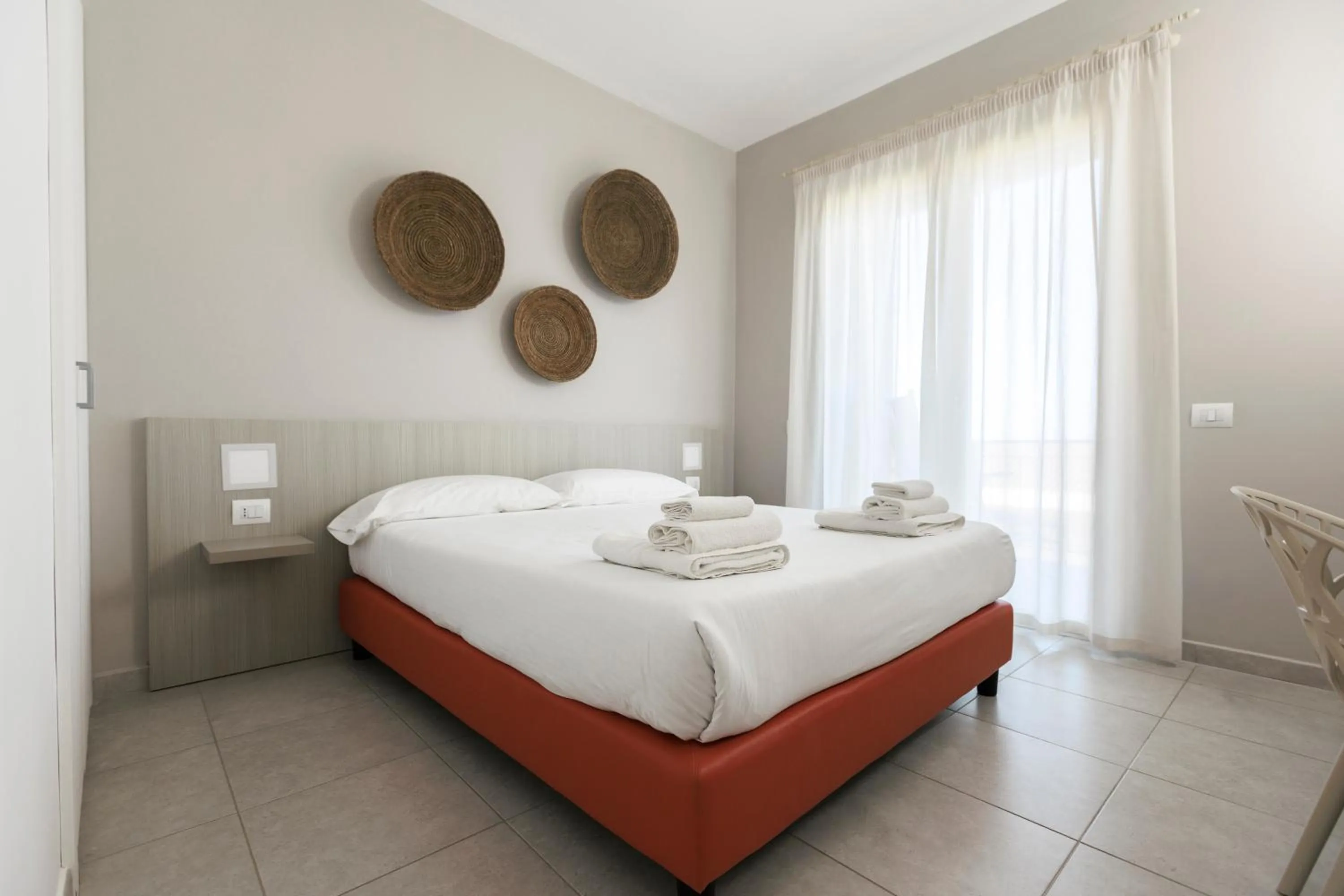 Bed in Luna Minoica Suites and Apartments