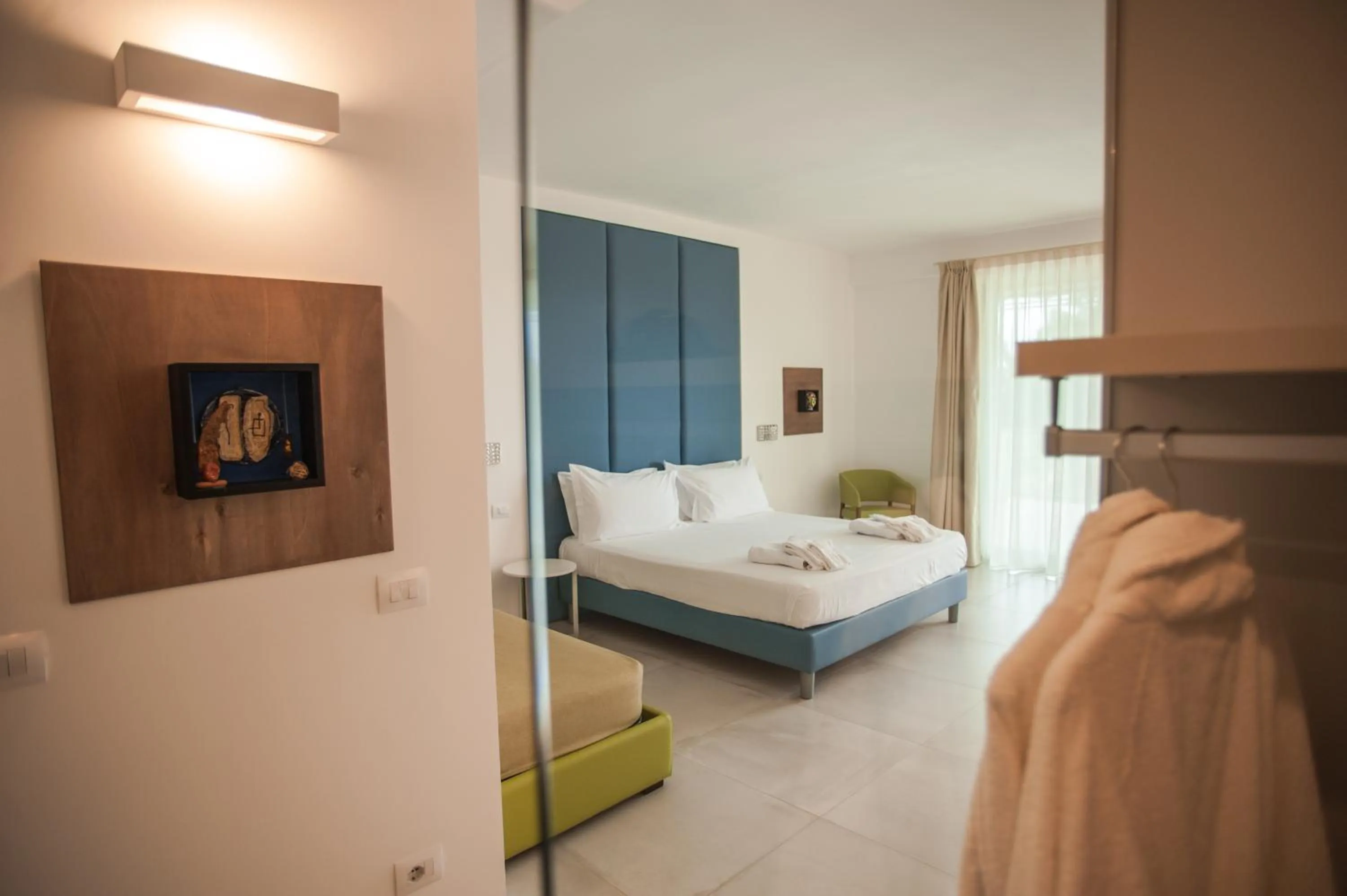 Bed in Luna Minoica Suites and Apartments