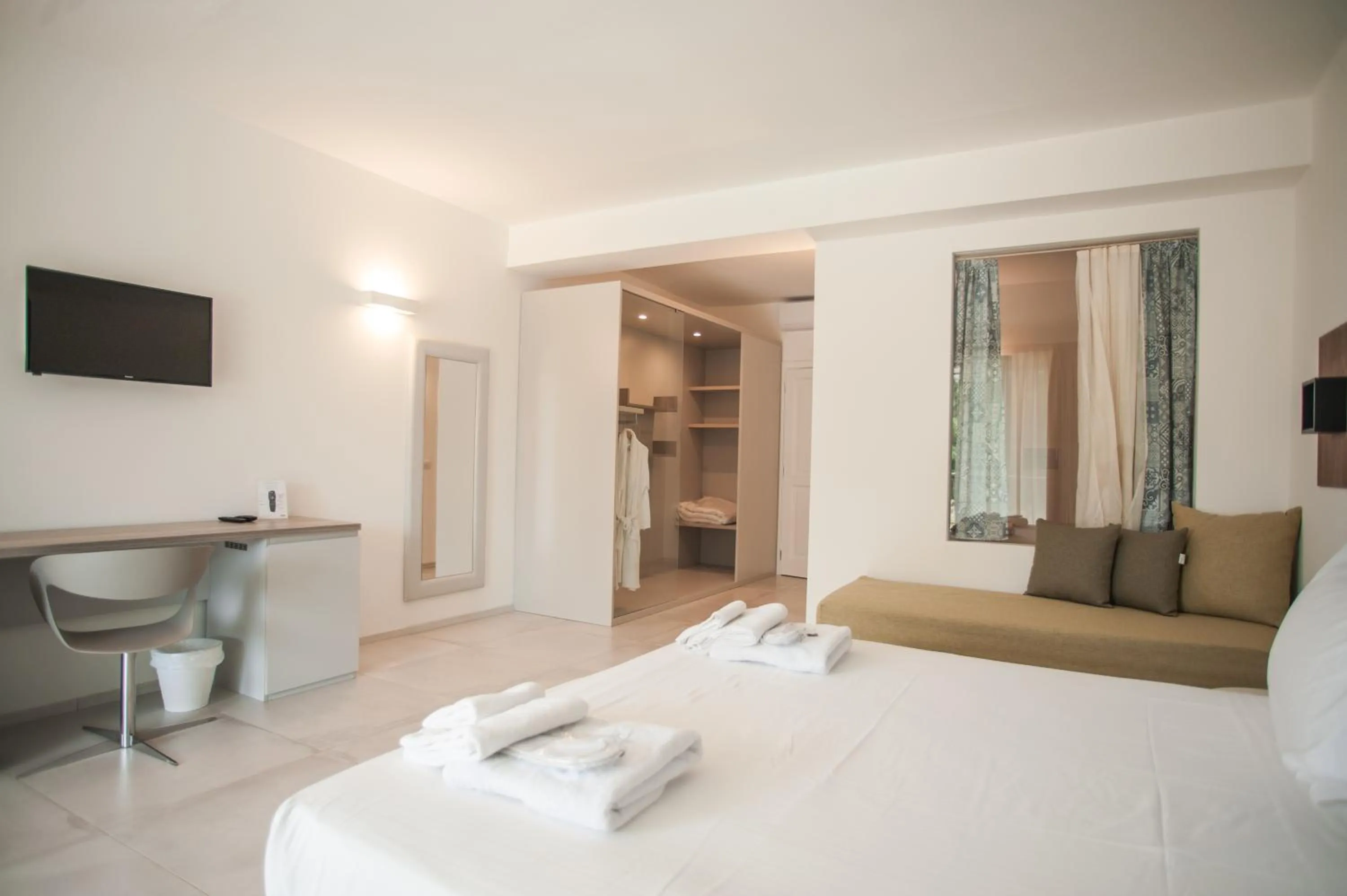 Bed in Luna Minoica Suites and Apartments