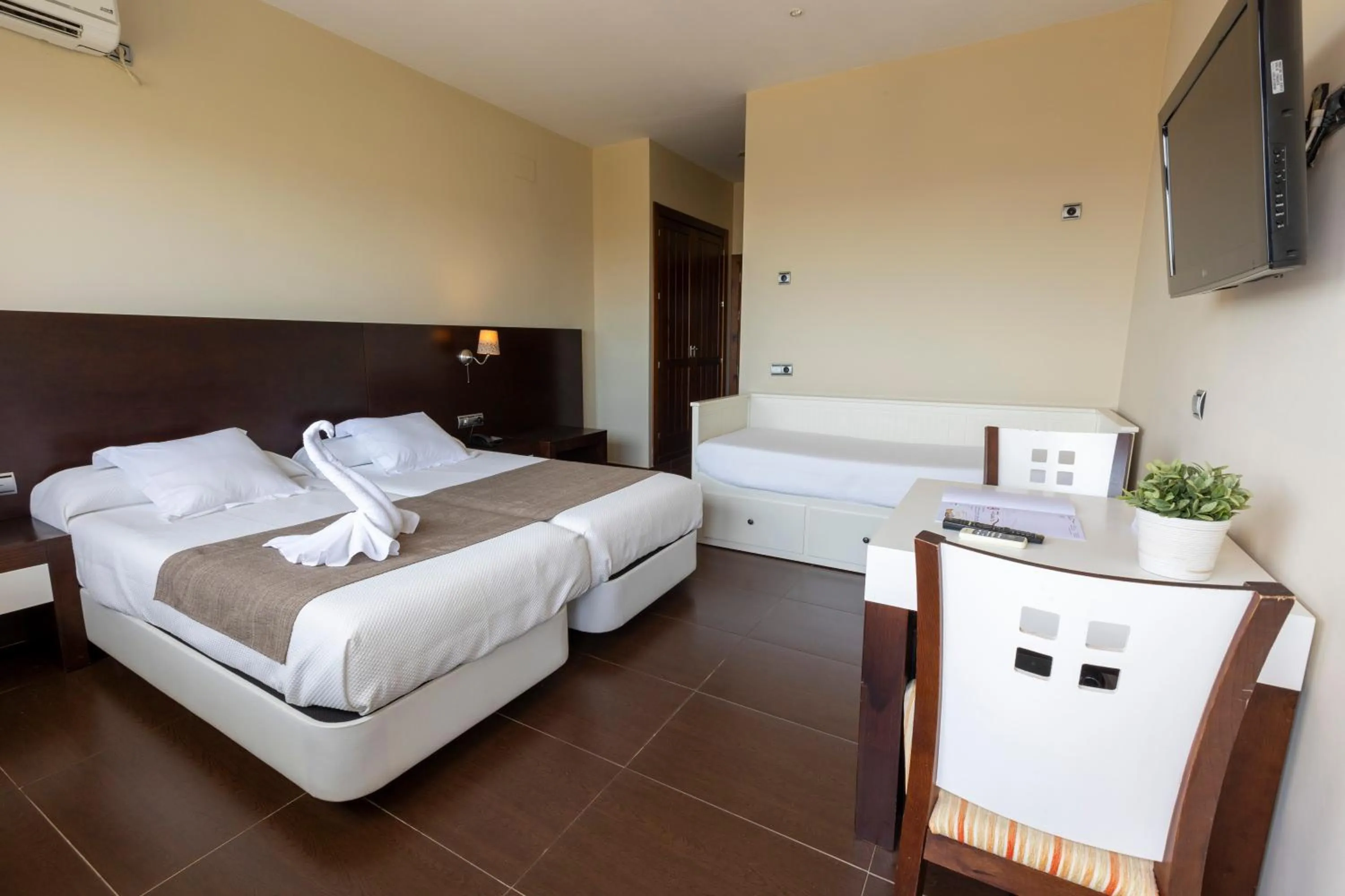 Bed in Hotel Flamero