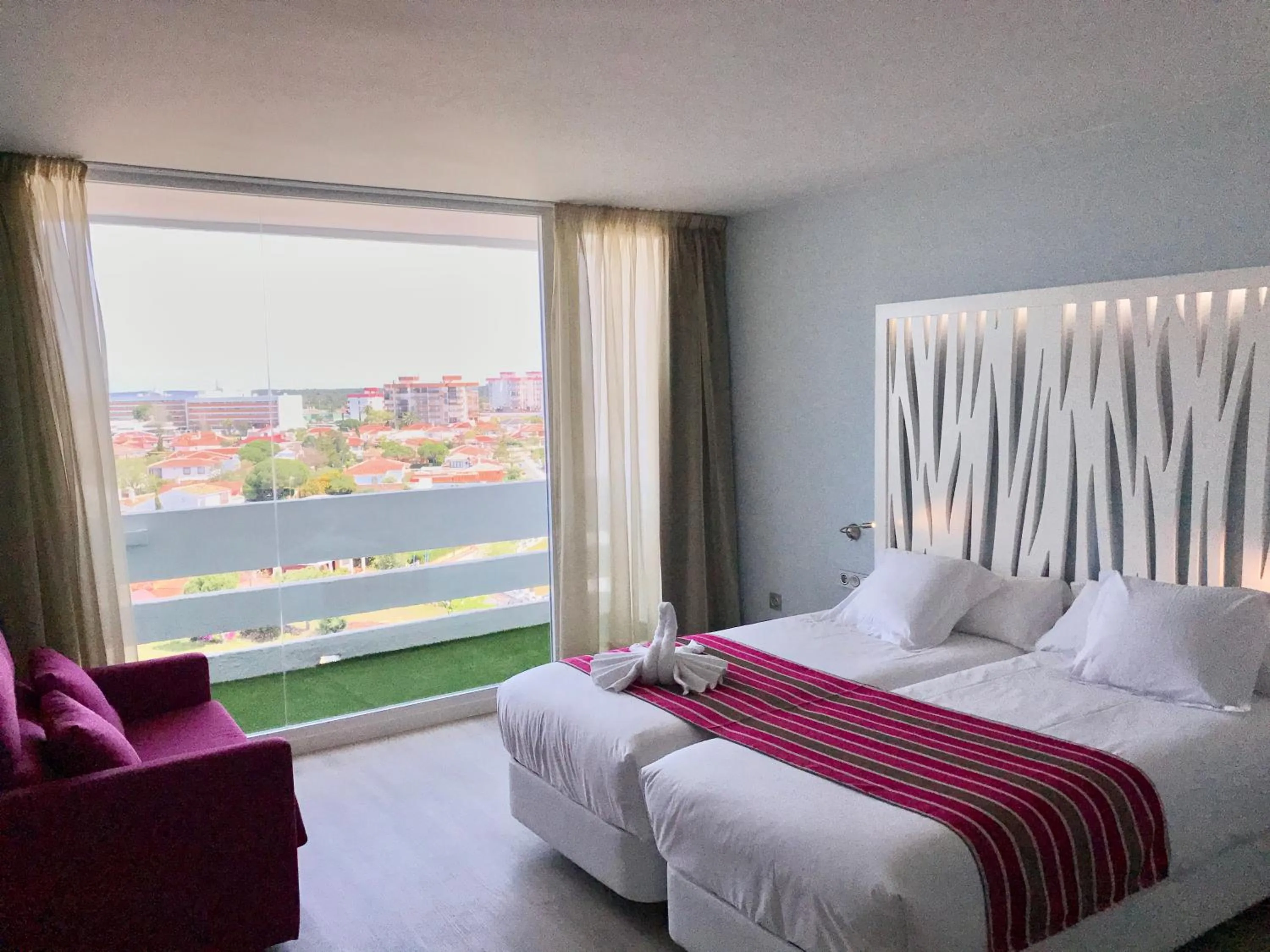 Bed in Hotel Flamero