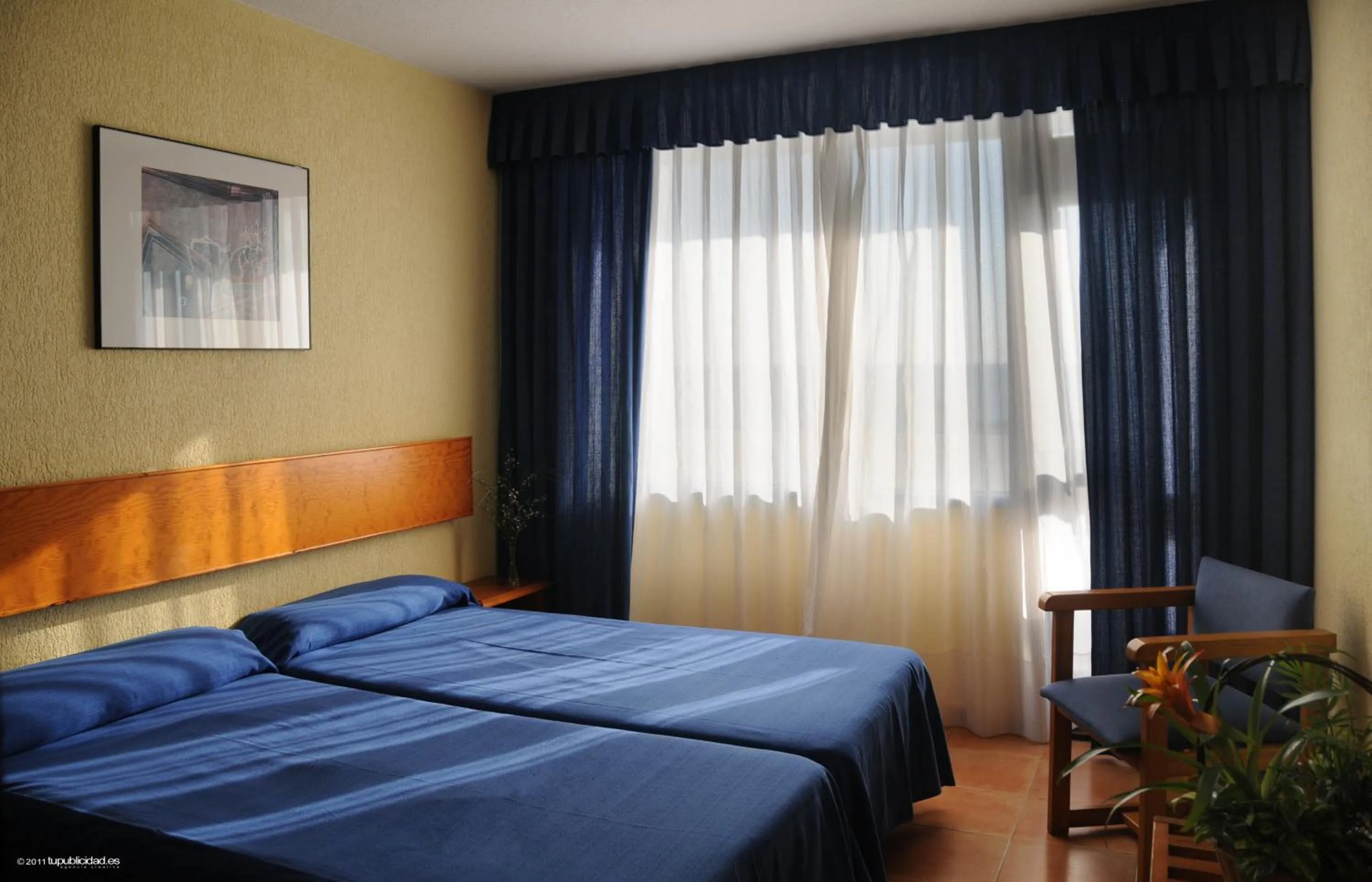 Bed in Hotel Flamero