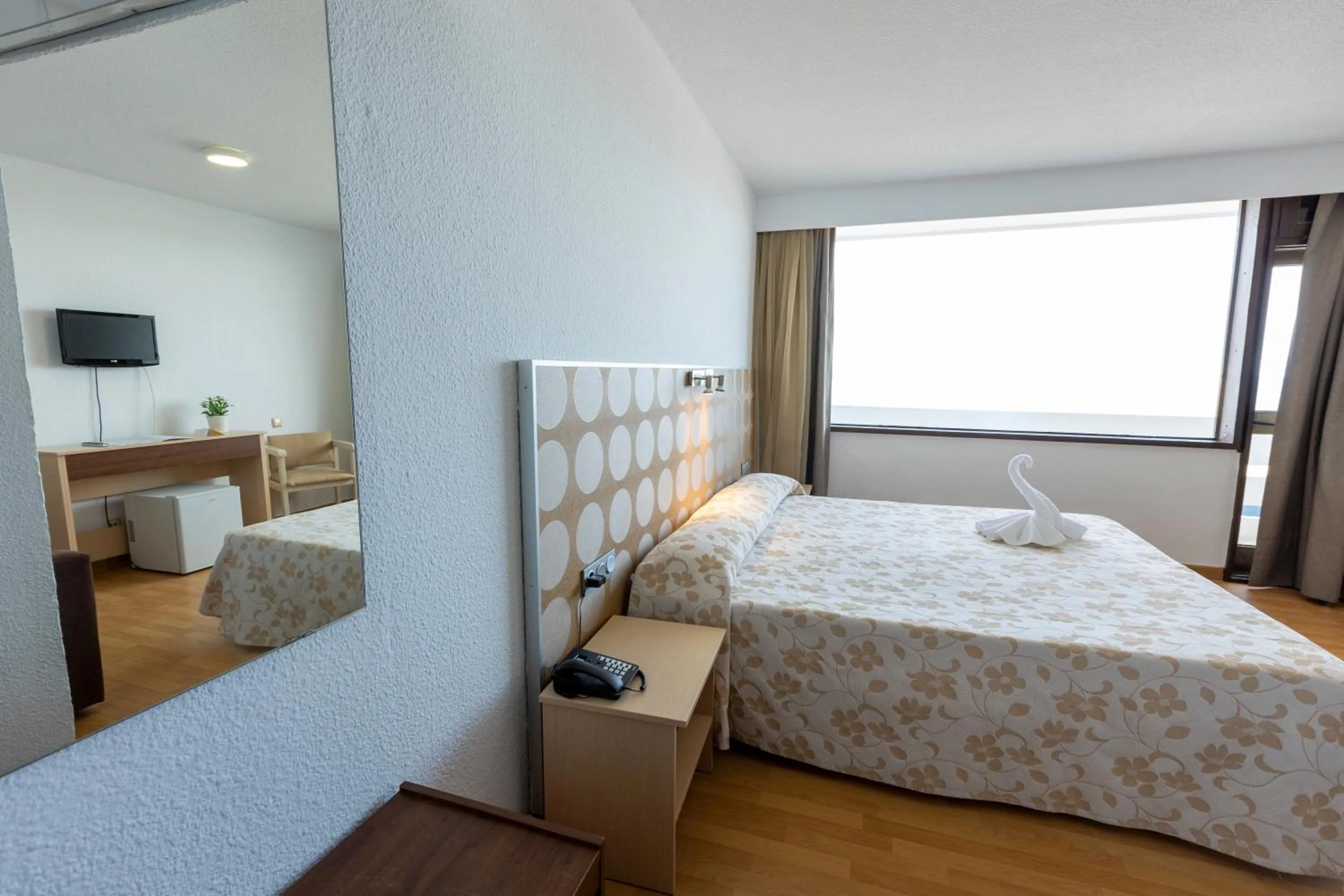 Bed in Hotel Flamero