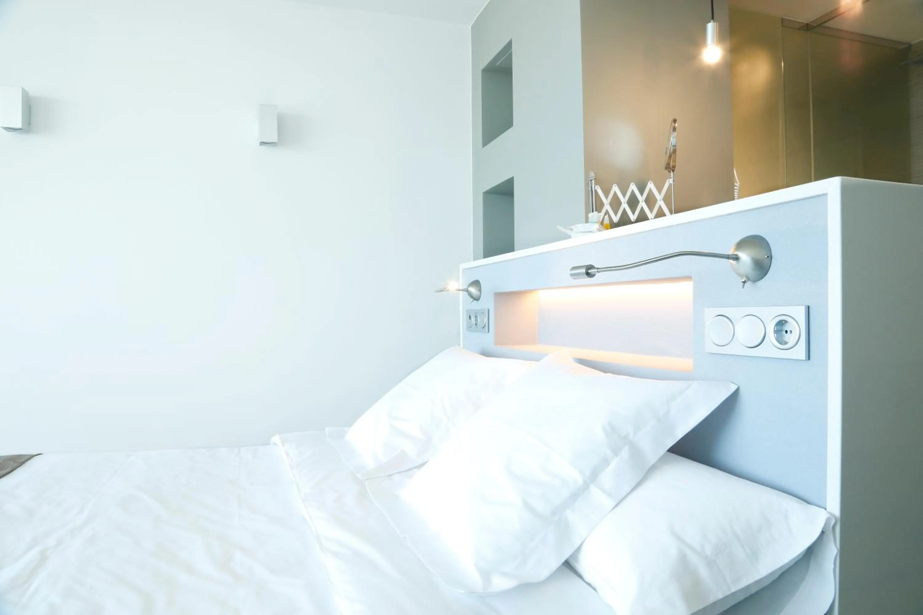 Bed in Hotel Flamero