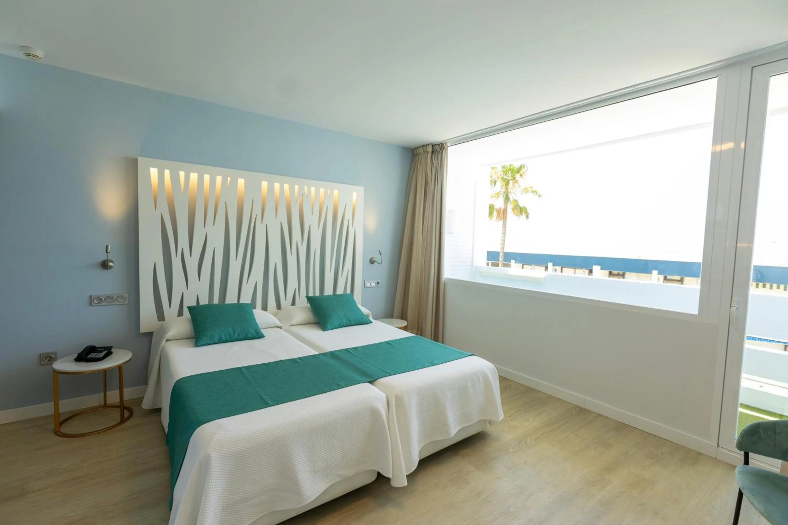 Bed in Hotel Flamero