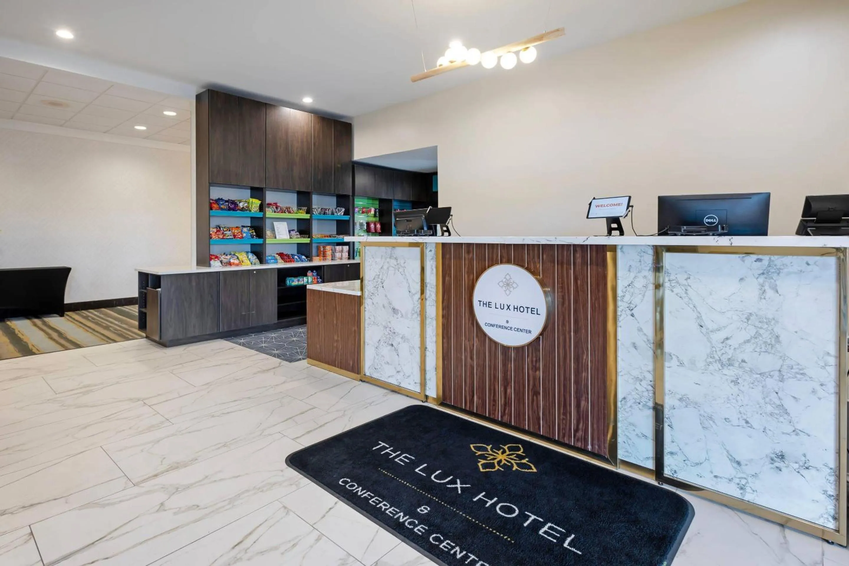 Lobby or reception in The Lux Hotel & Conference Center, an Ascend Collection Hotel