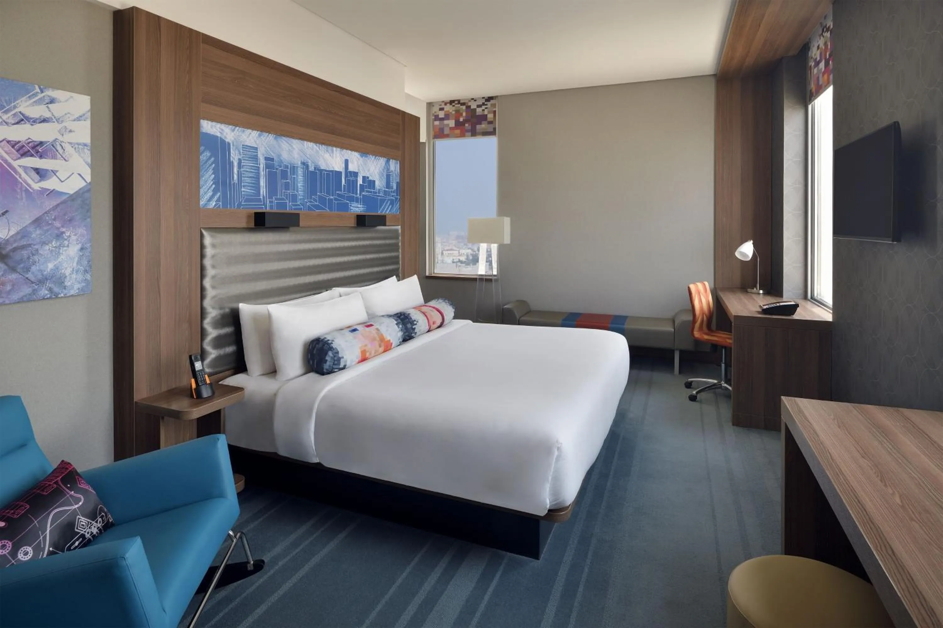 Photo of the whole room, Bed in Aloft Dhahran Hotel