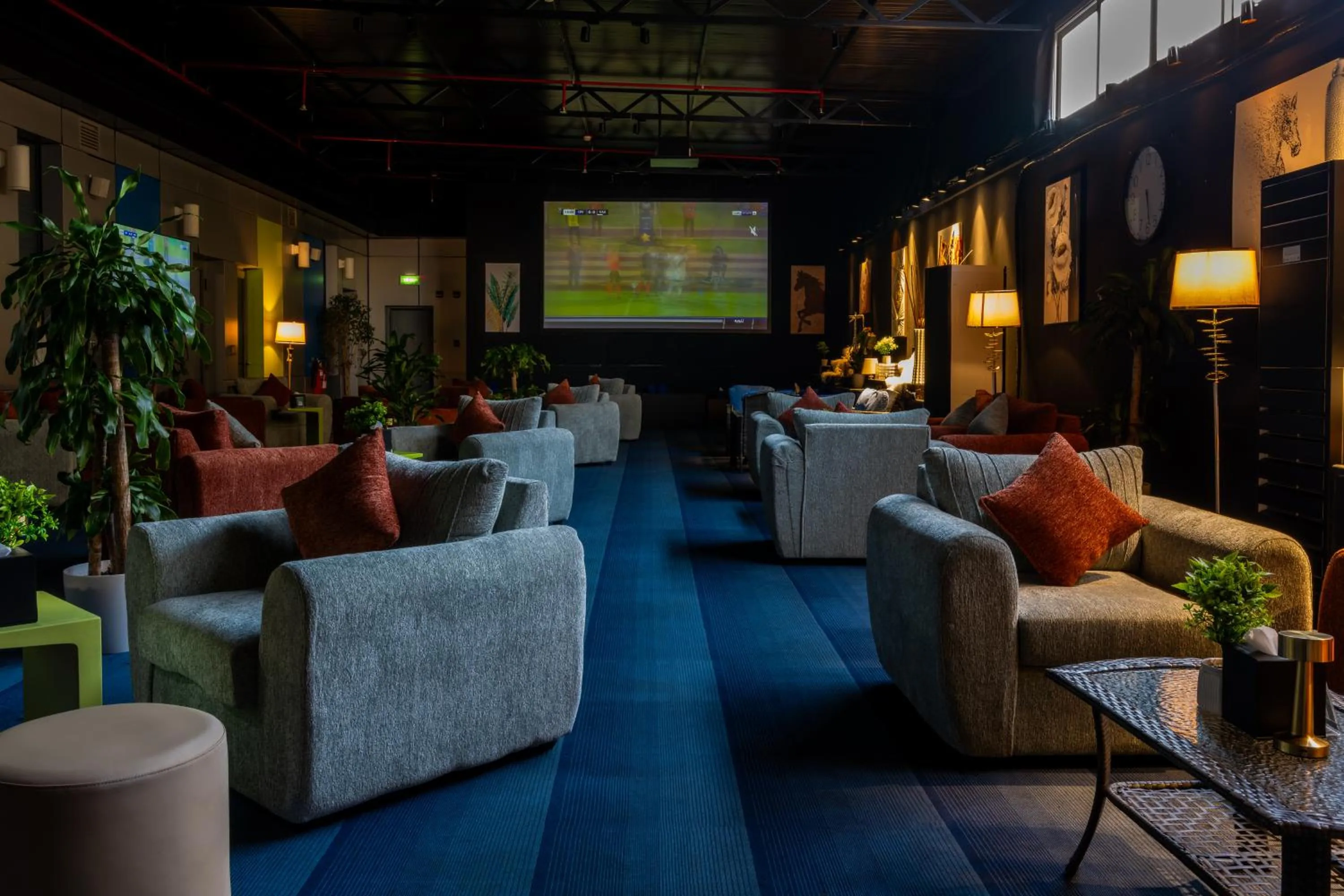 Communal lounge/ TV room in Aloft Dhahran Hotel