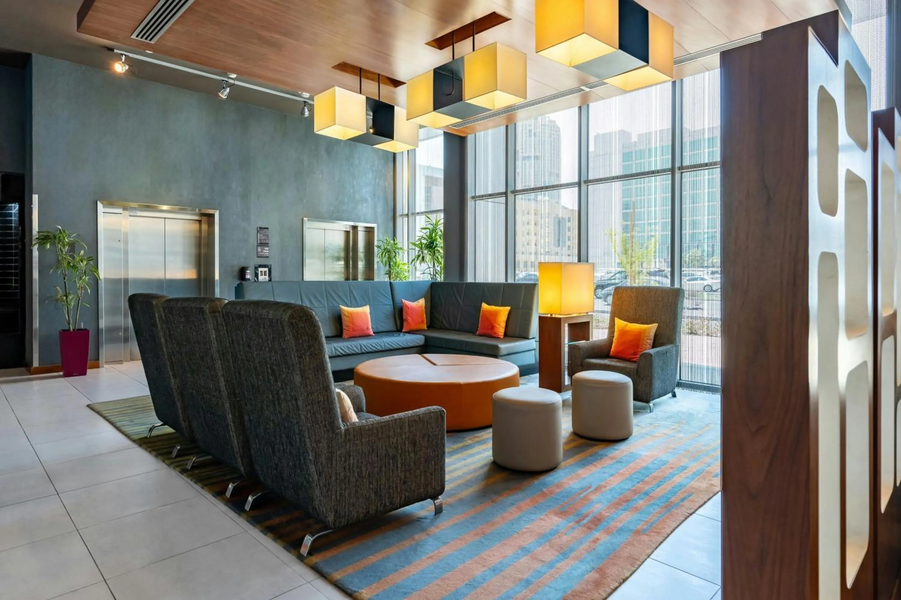 Lobby or reception in Aloft Riyadh Hotel