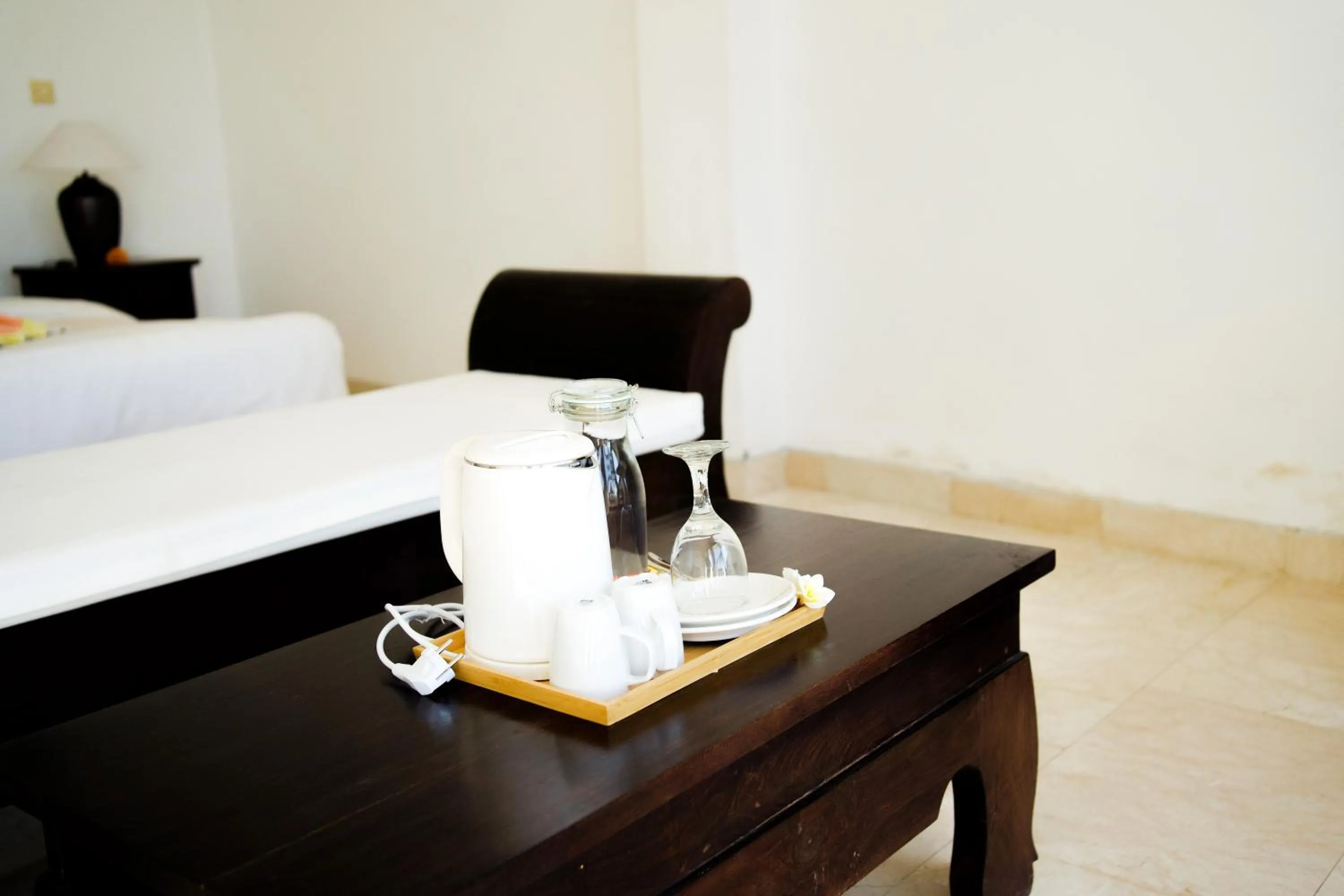 Coffee/tea facilities, Bed in Alam Bali Beach Resort