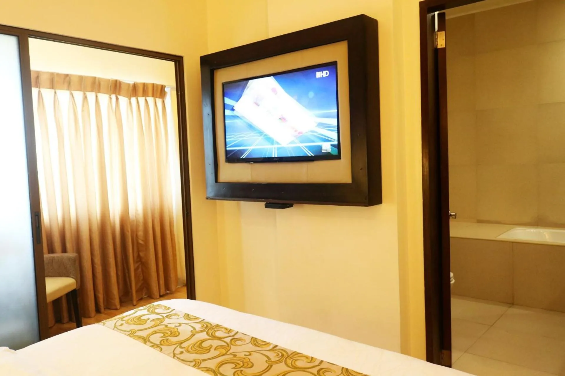 TV/Entertainment Center in Palm Grass Hotel