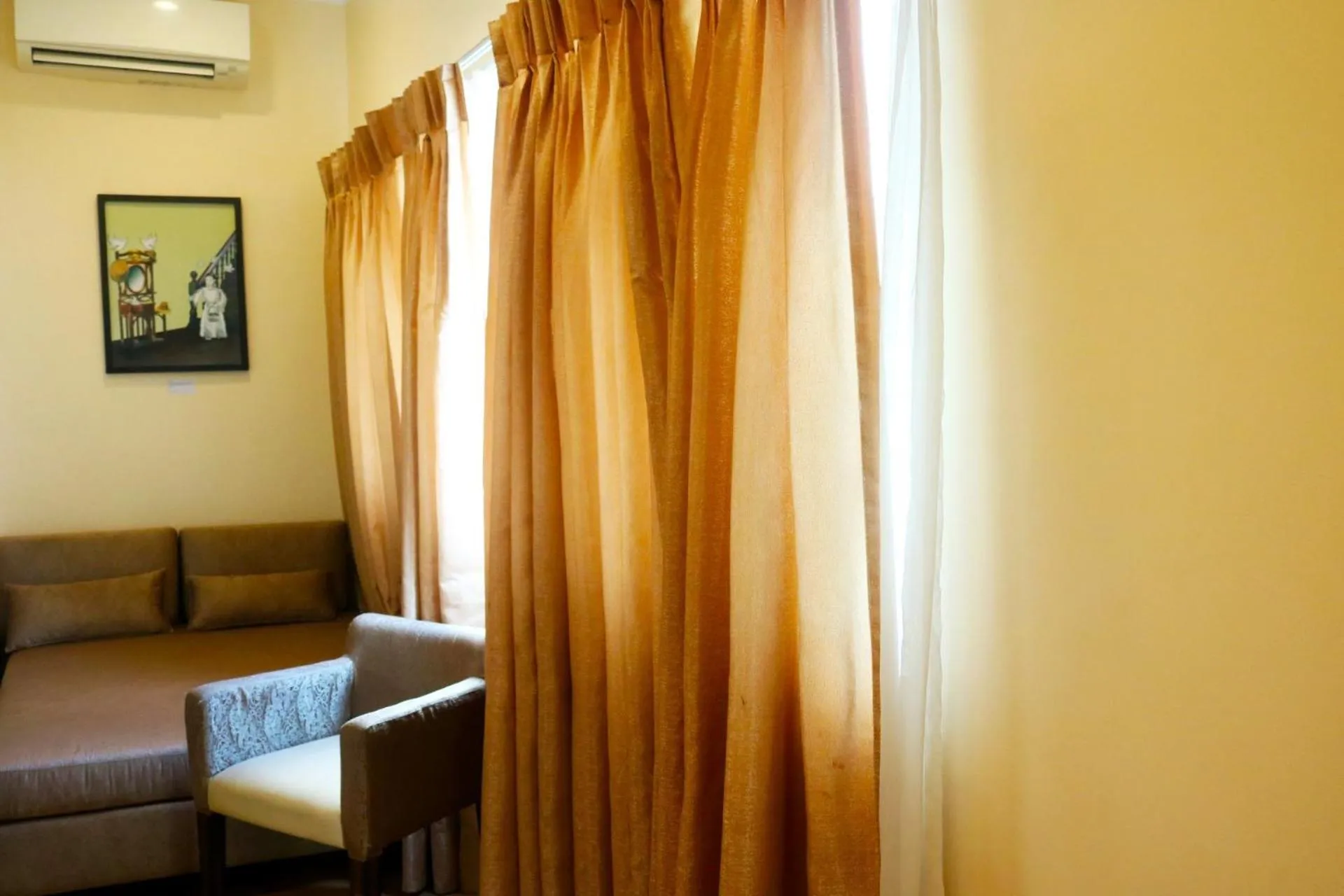 Seating Area in Palm Grass Hotel