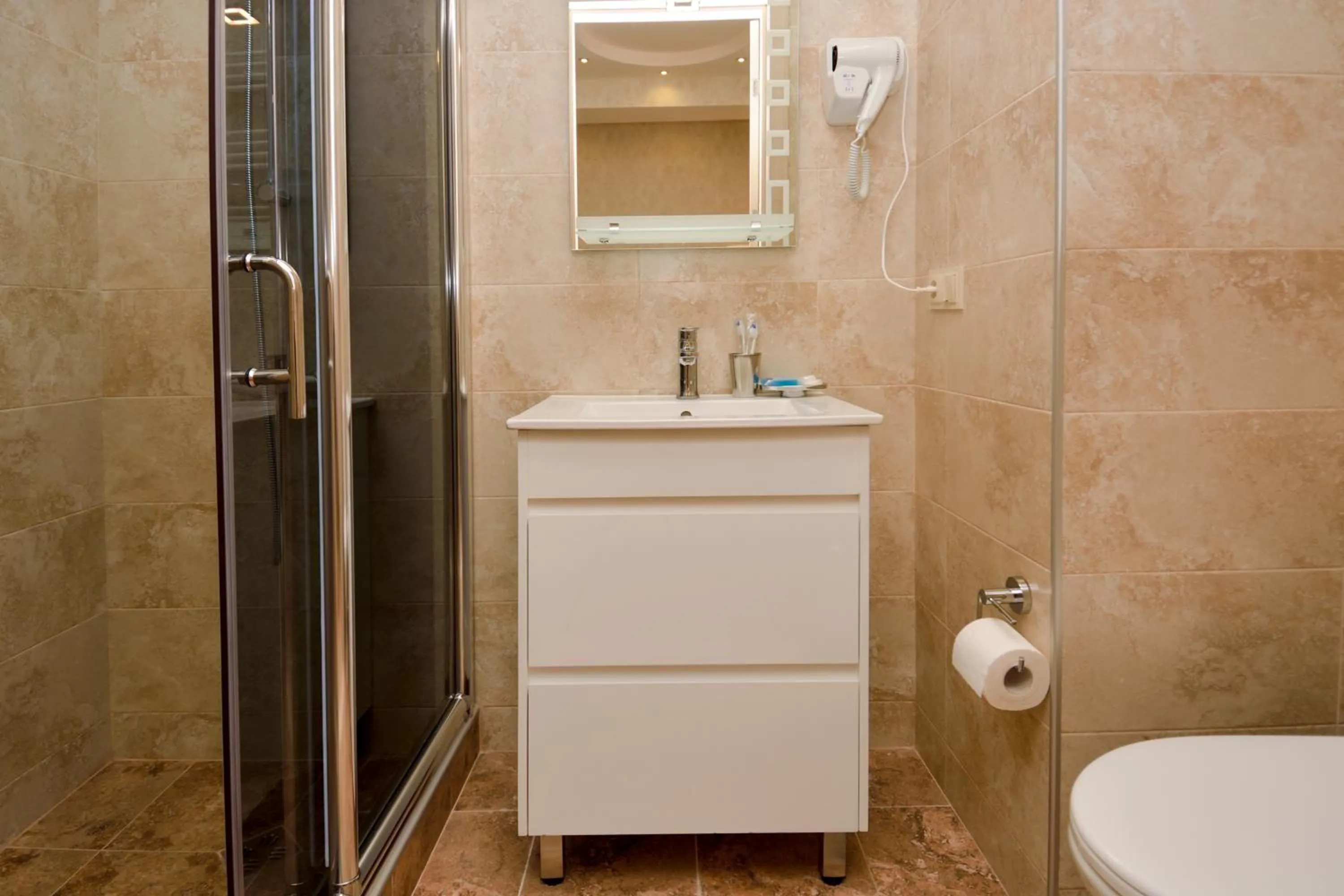 Shower in Dat Exx Apartments