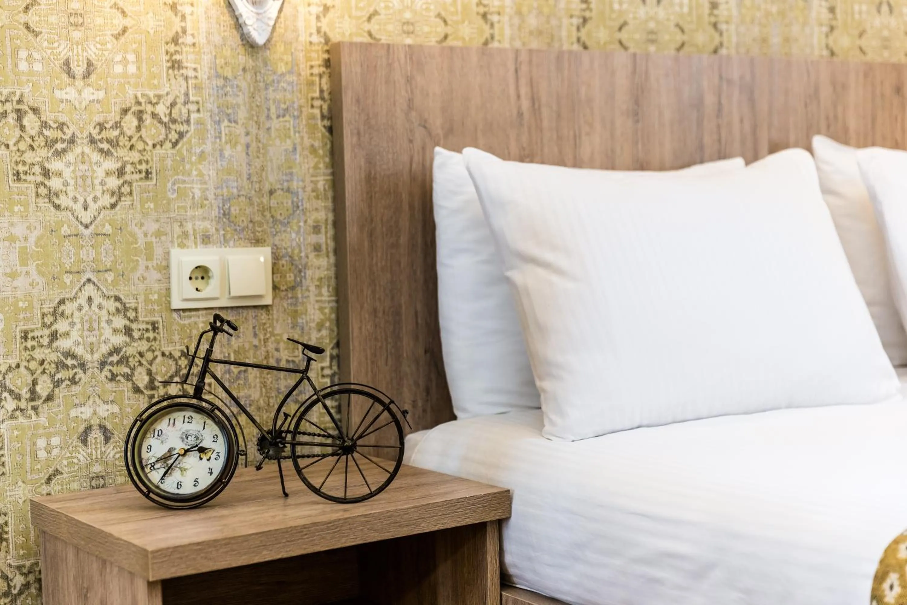 Decorative detail, Bed in Dat Exx Apartments