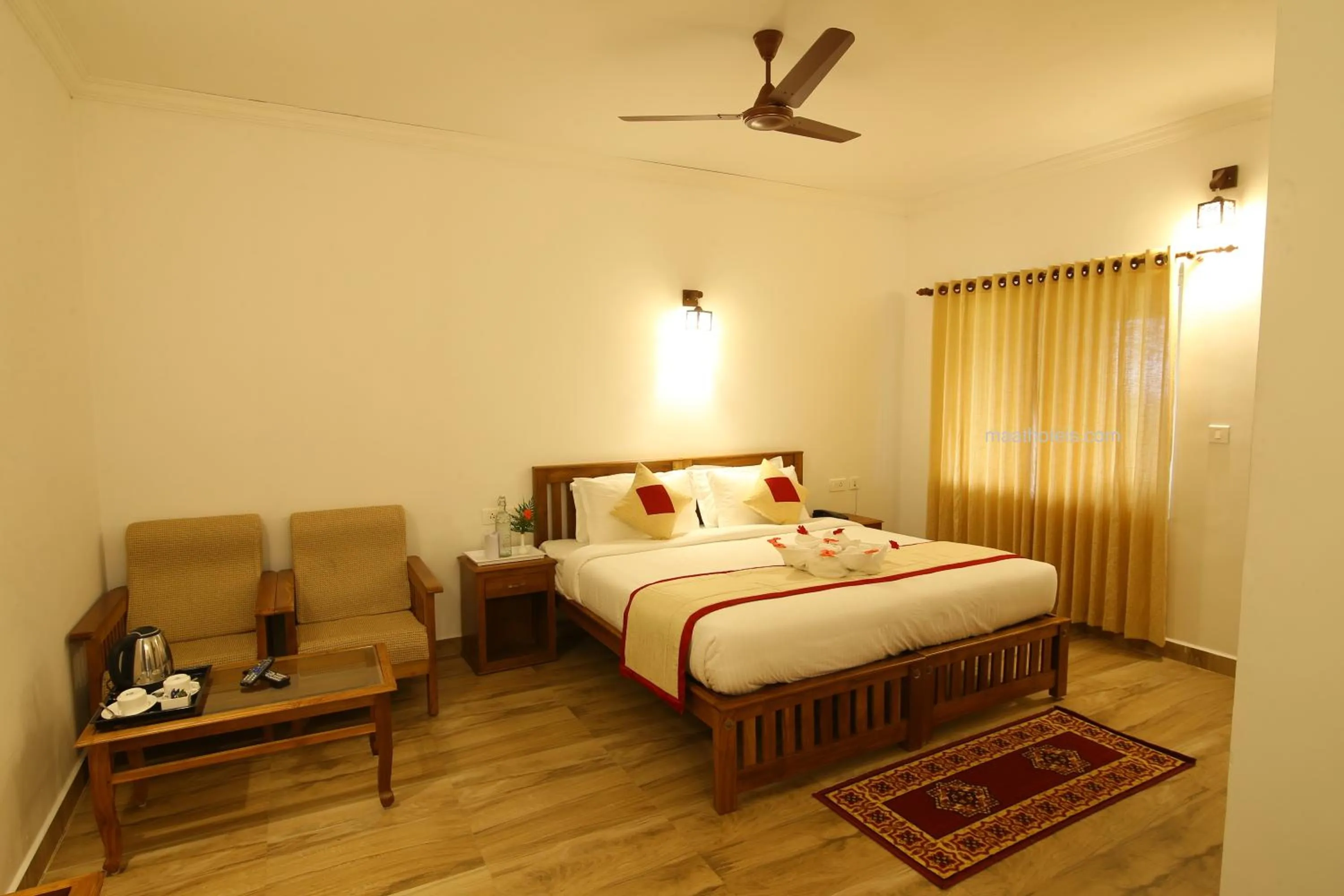 Bed in Dew Drops Farm Resorts