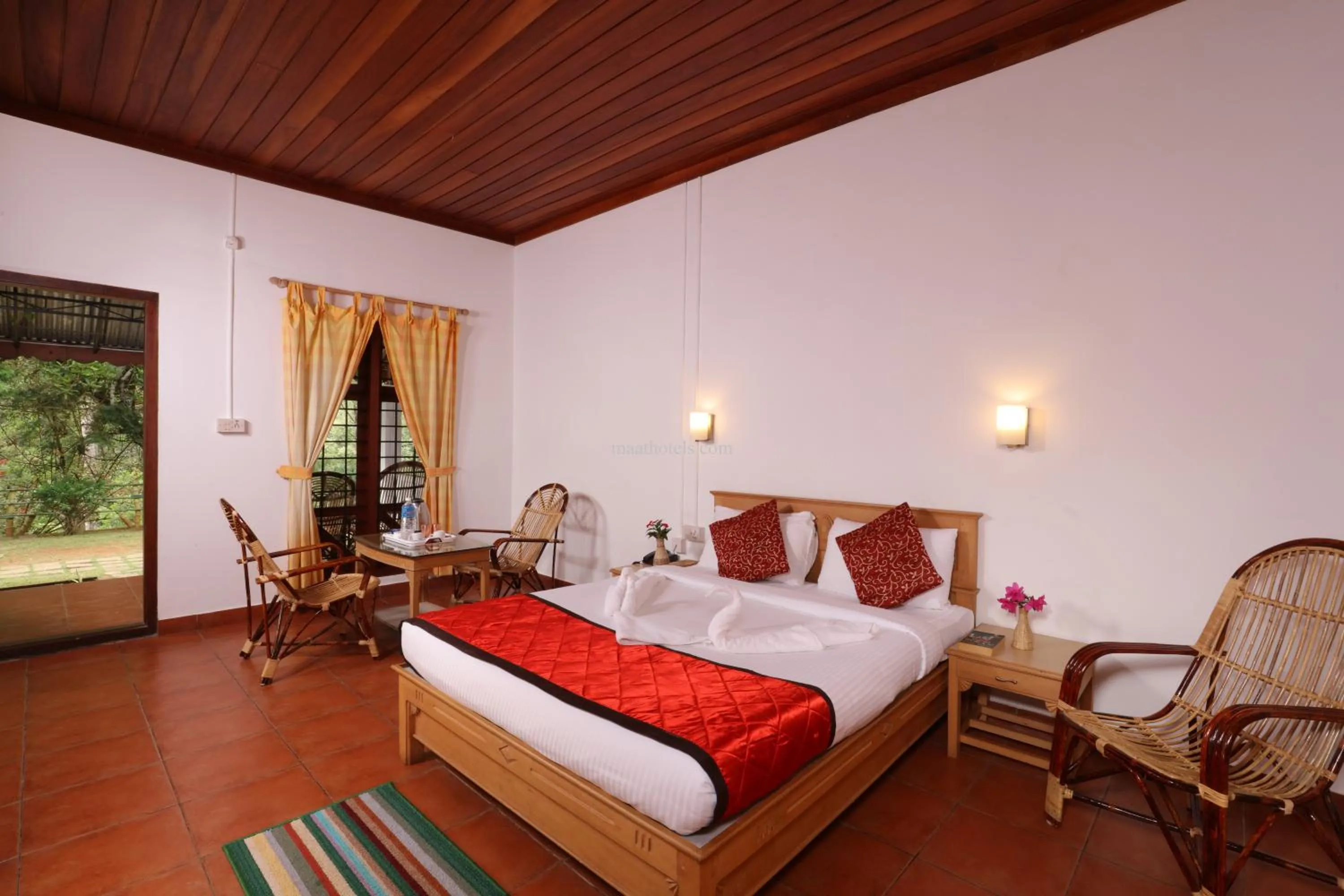 Deluxe Double Room (2 Adults + 1 Child) in Dew Drops Farm Resorts