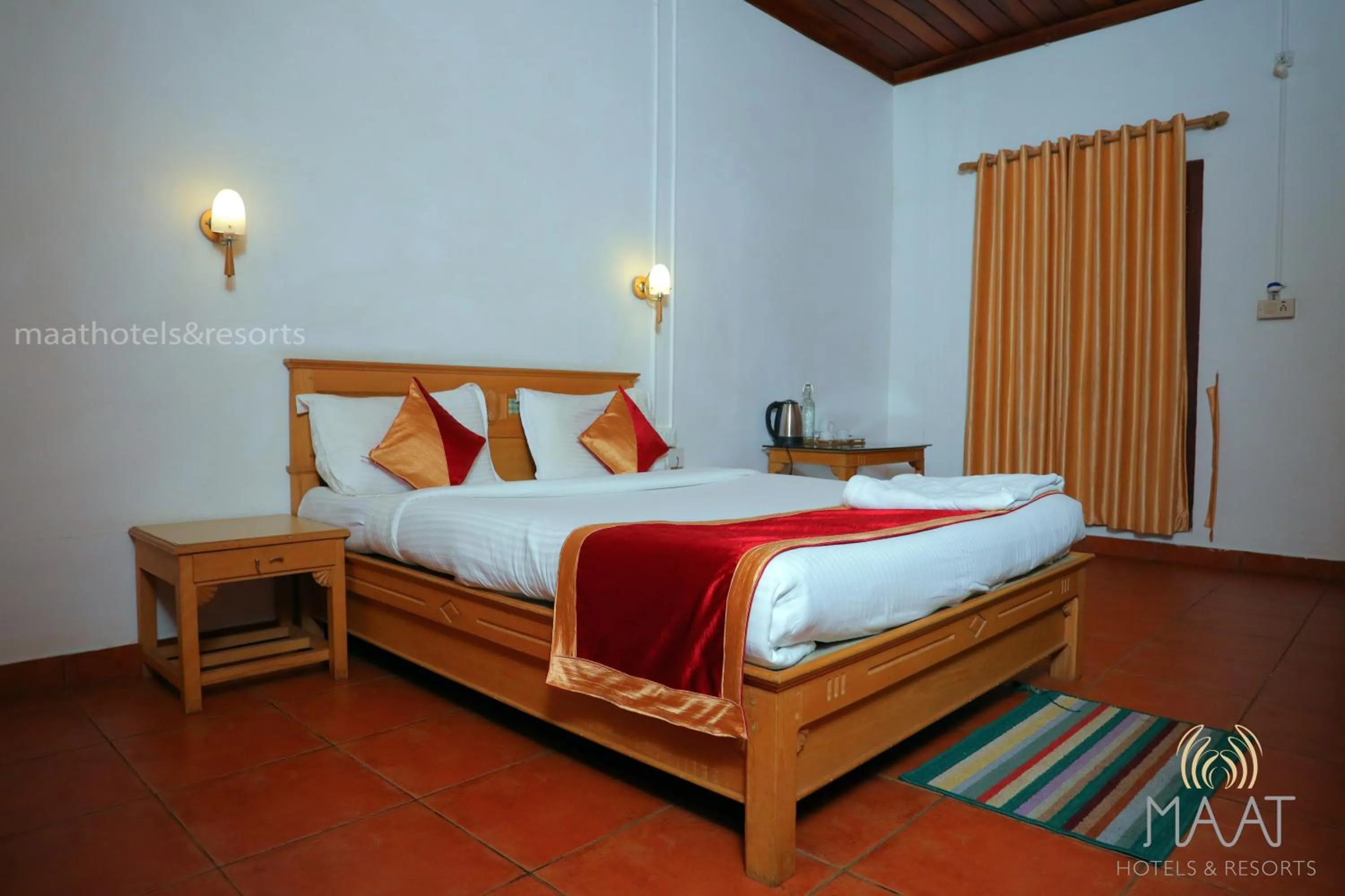 Bed in Dew Drops Farm Resorts