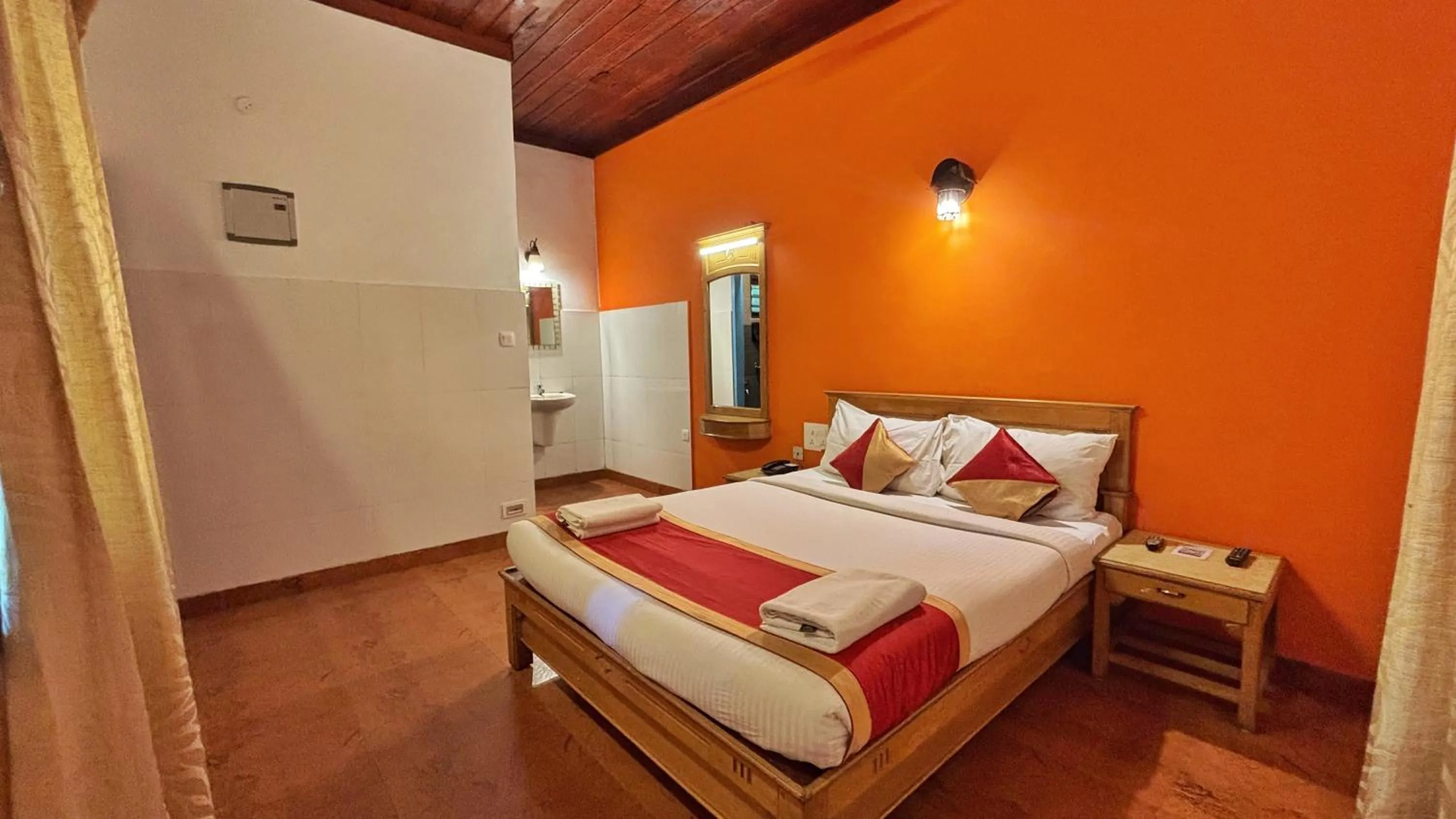 Bed in Dew Drops Farm Resorts