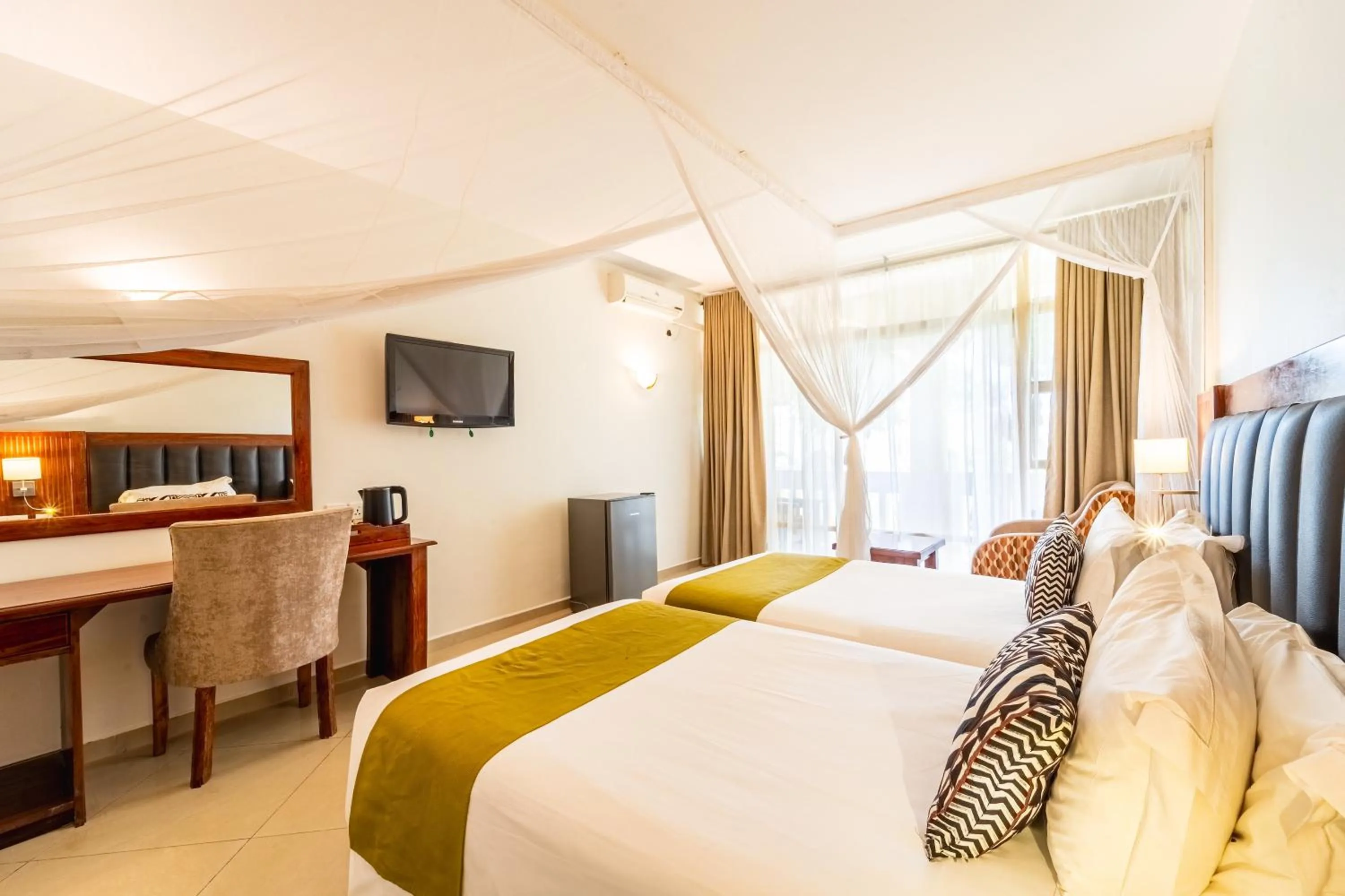 Bed in Victoria Falls Rainbow Hotel