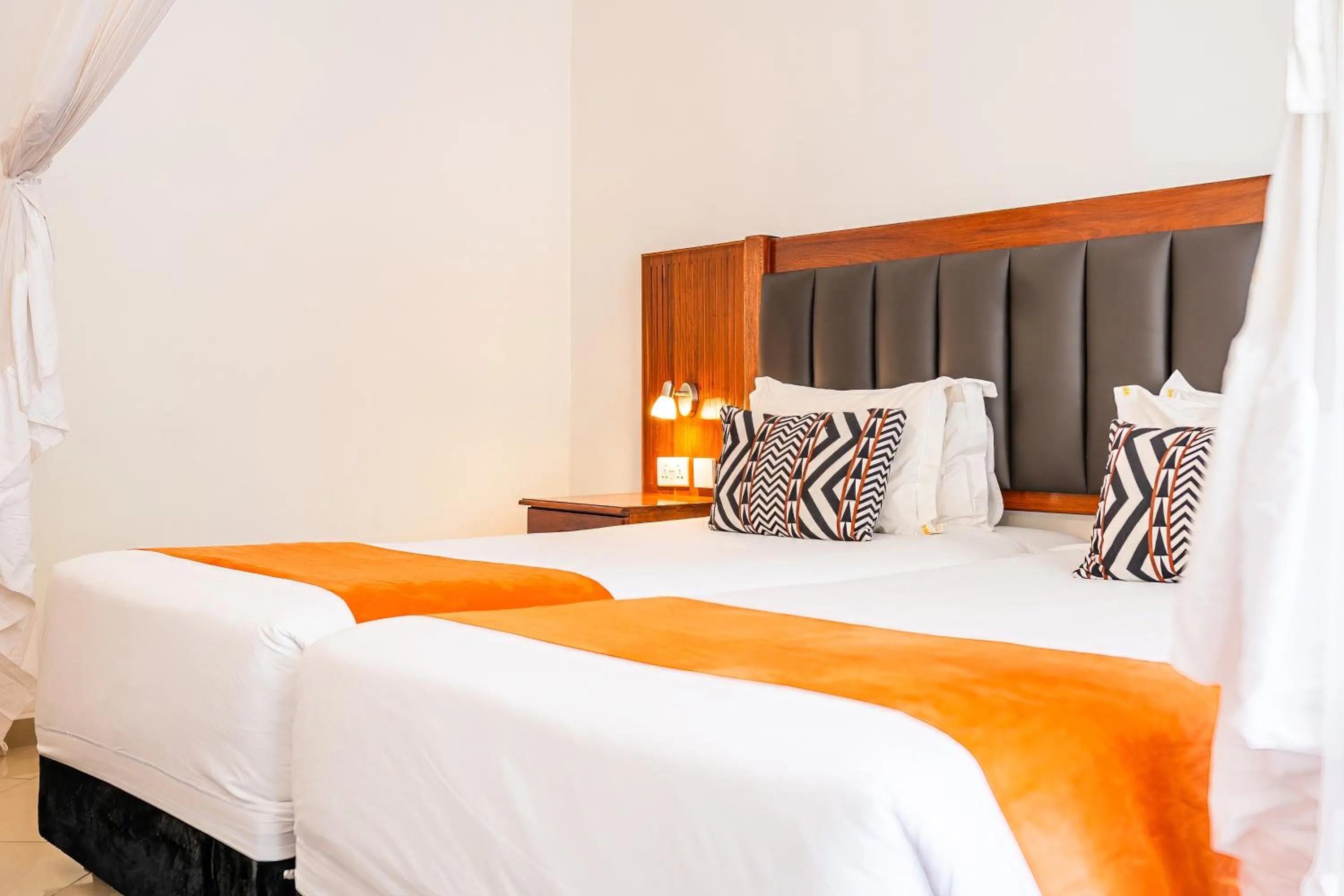 Bed in Victoria Falls Rainbow Hotel