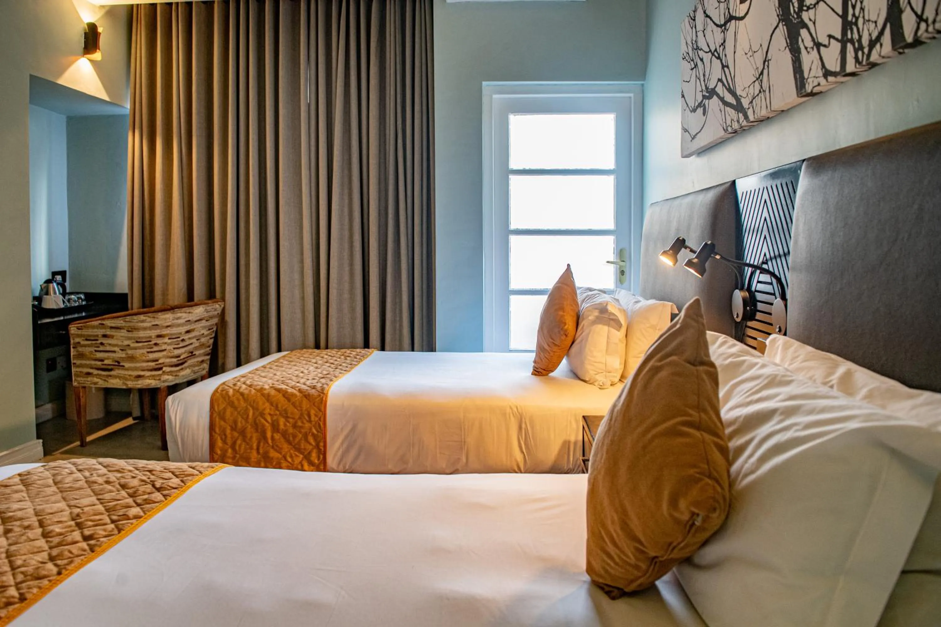 Bed in New Ambassador Hotel