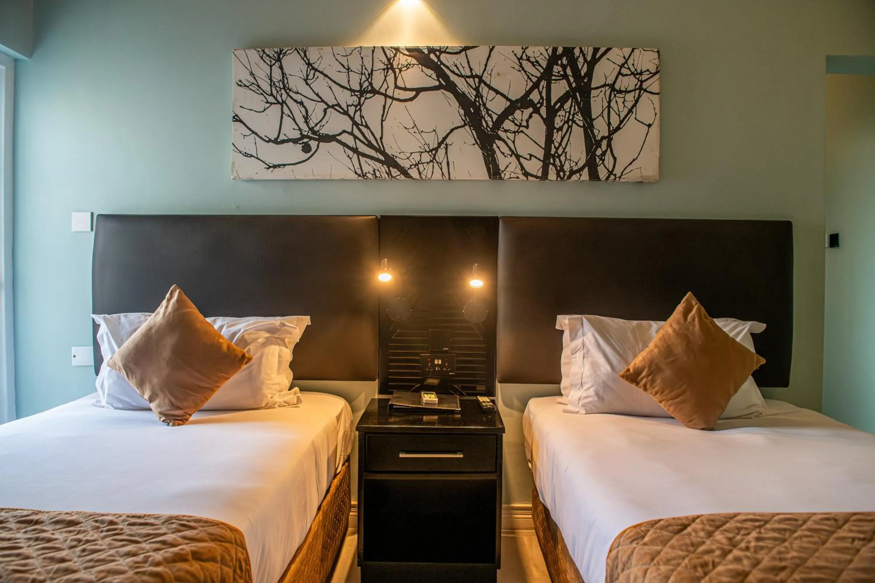 Bed in New Ambassador Hotel