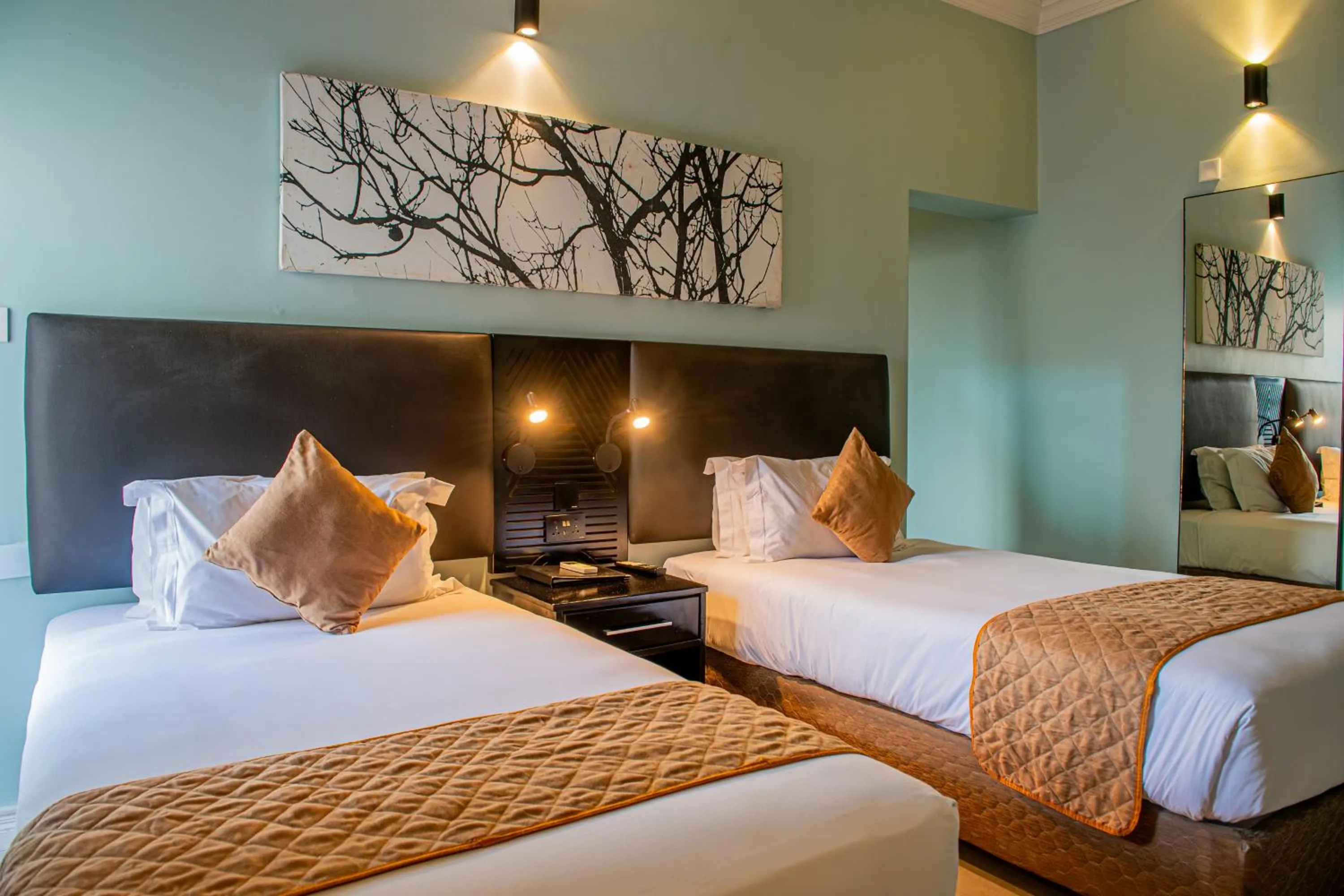 Bed in New Ambassador Hotel