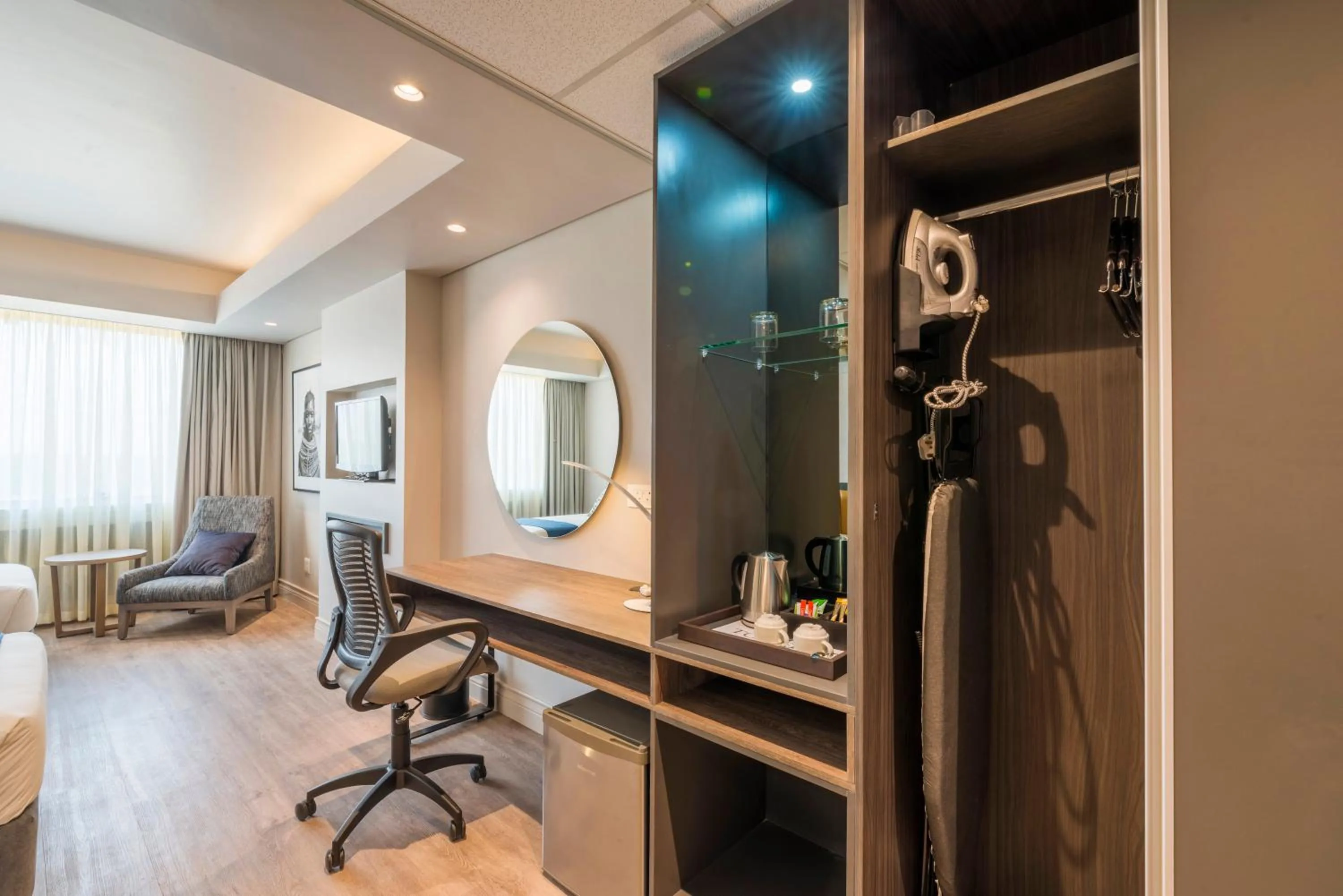 Bedroom in Rainbow Towers Hotel & Conference Centre