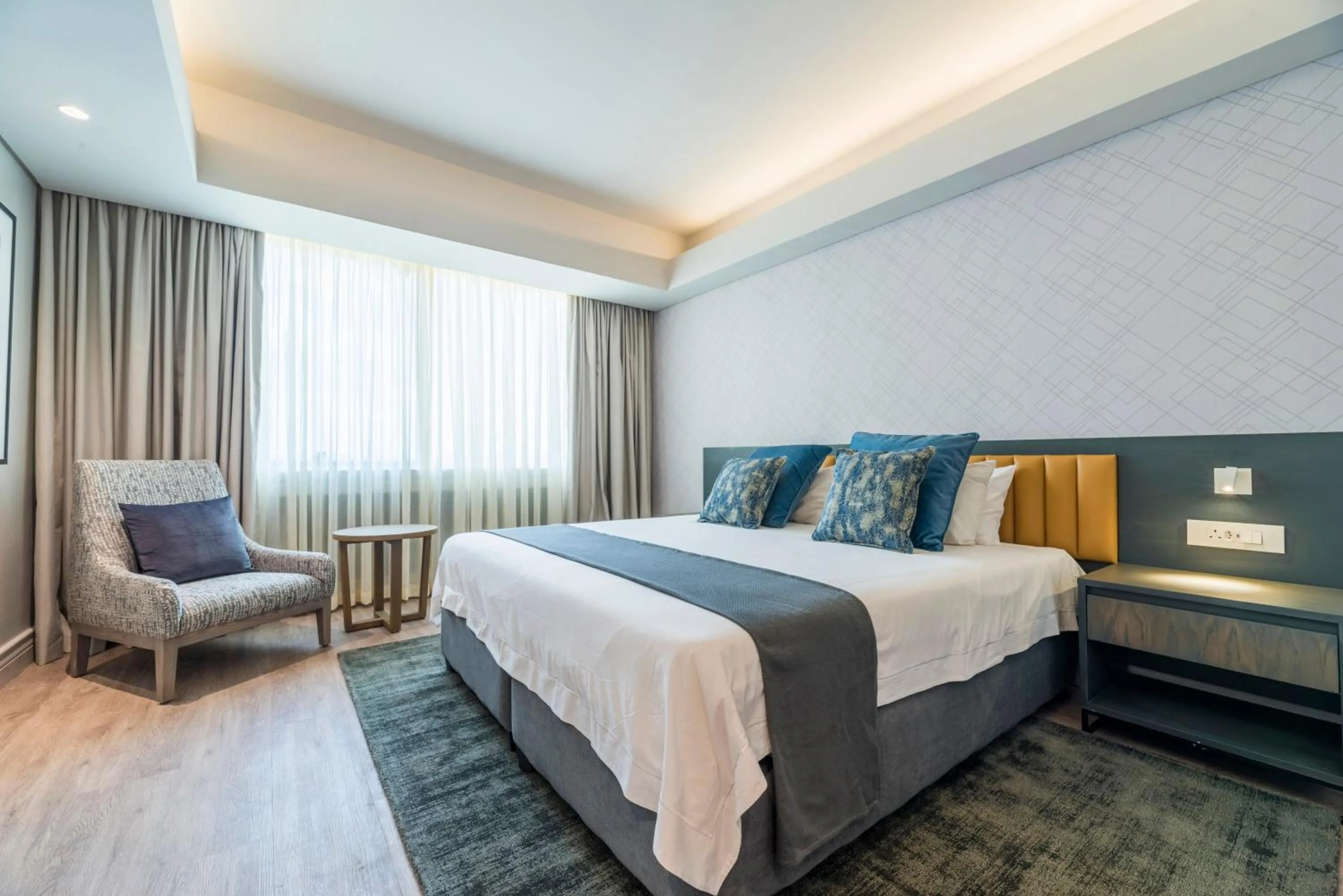 Bedroom, Bed in Rainbow Towers Hotel & Conference Centre