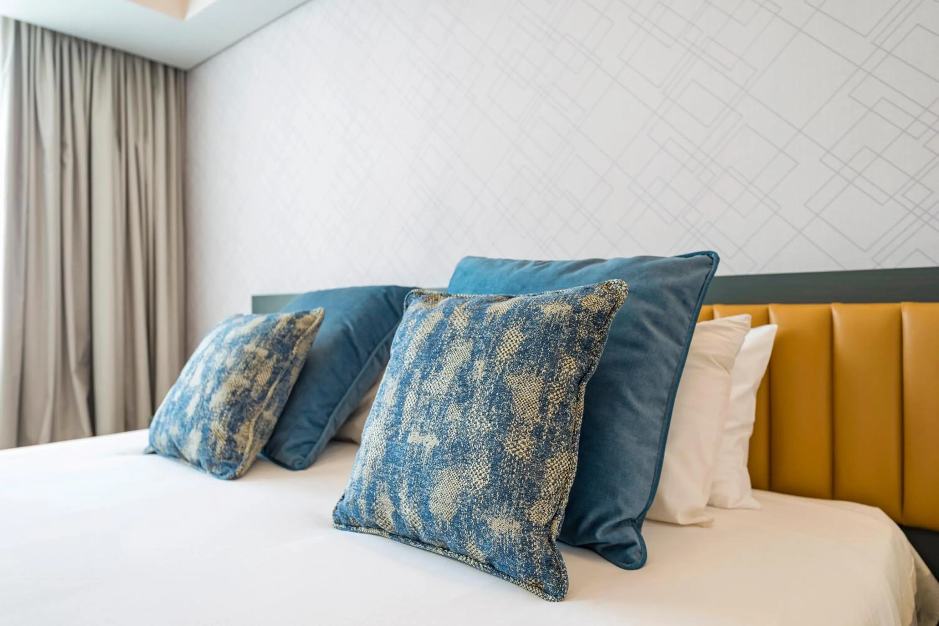 Bed in Rainbow Towers Hotel & Conference Centre