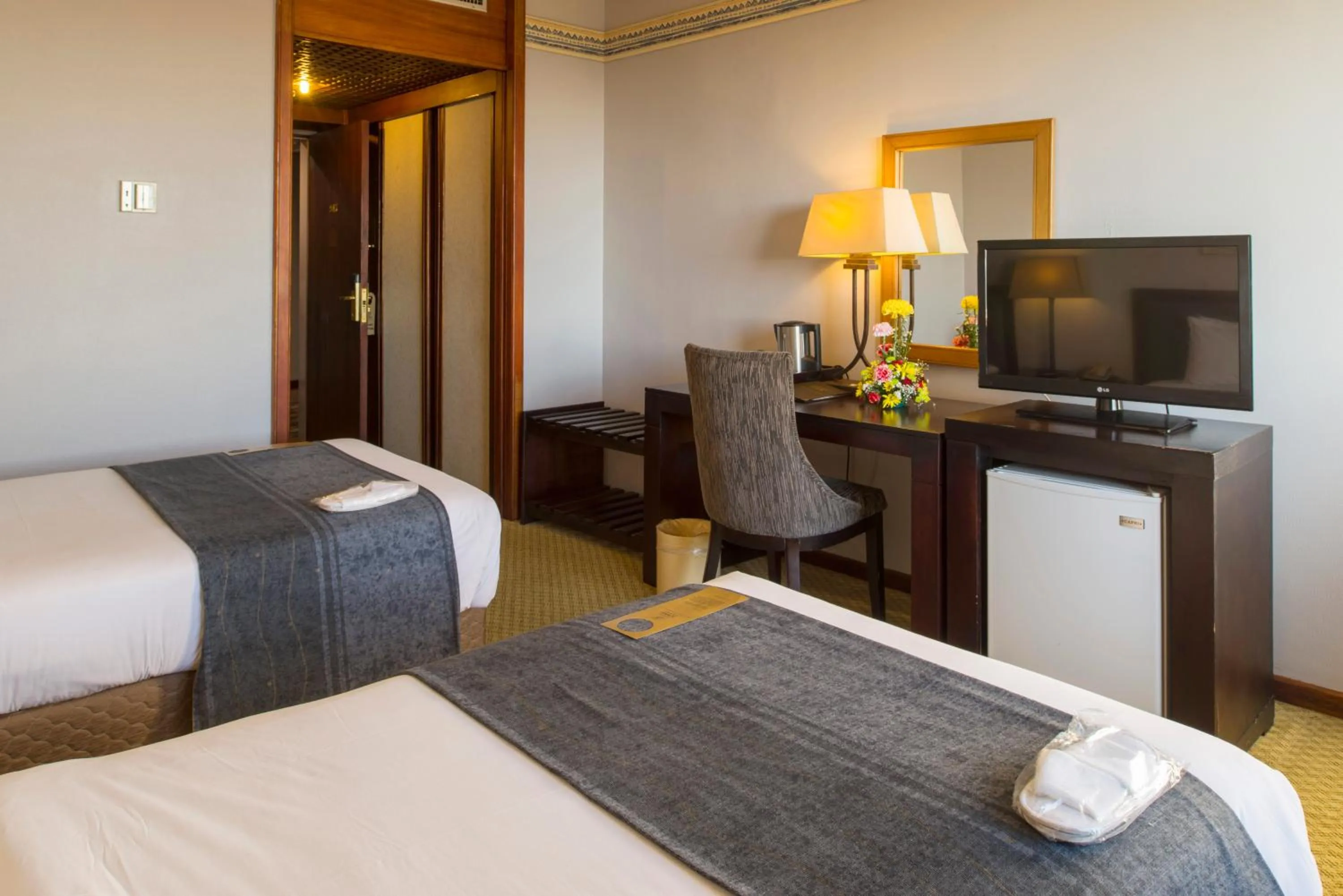 Bedroom, Bed in Rainbow Towers Hotel & Conference Centre