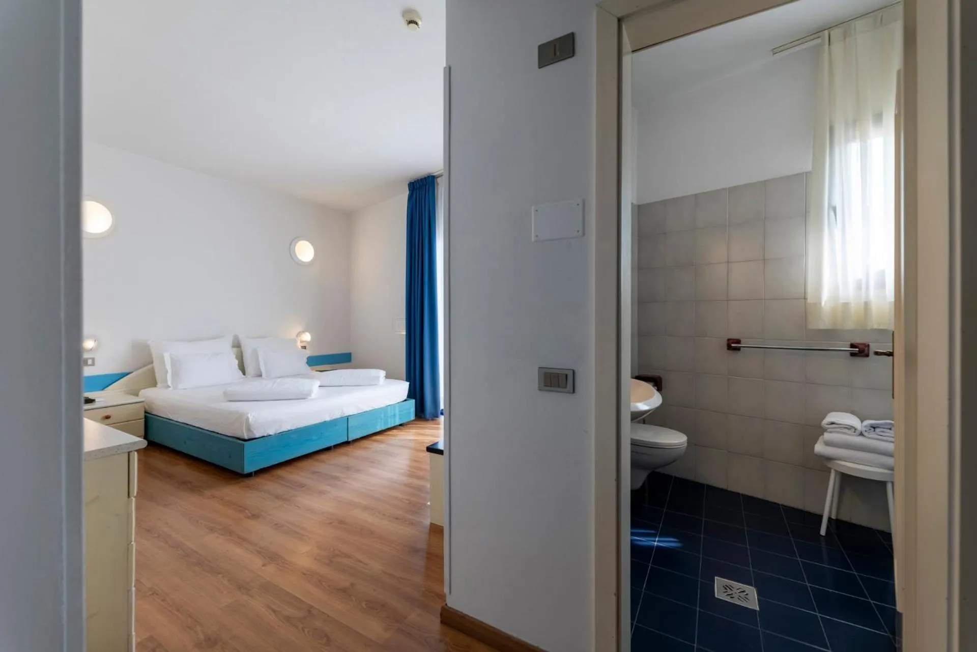 Photo of the whole room, Bed in Hi Hotels Riva del Garda