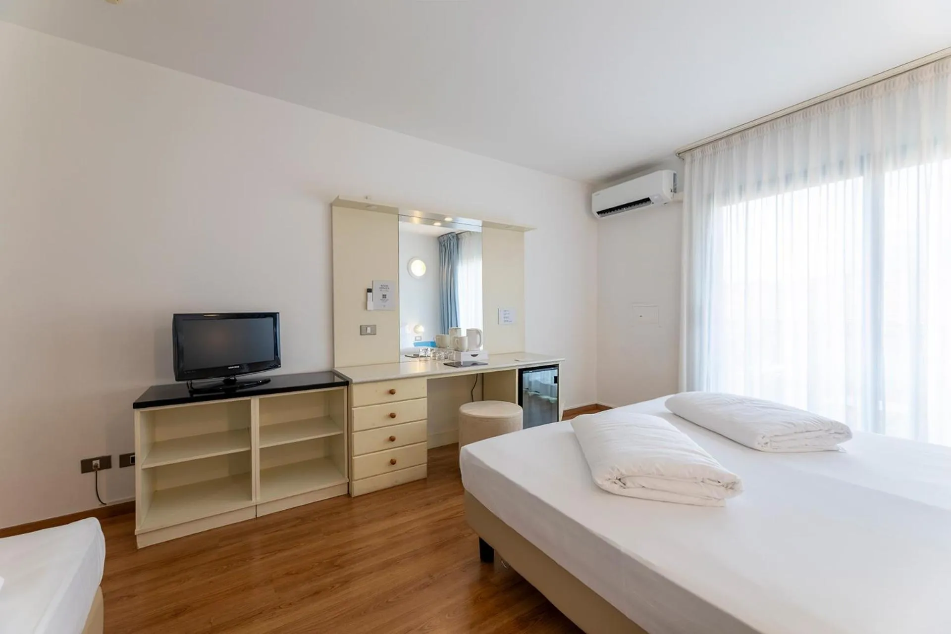 Bed in Hi Hotels Riva del Garda