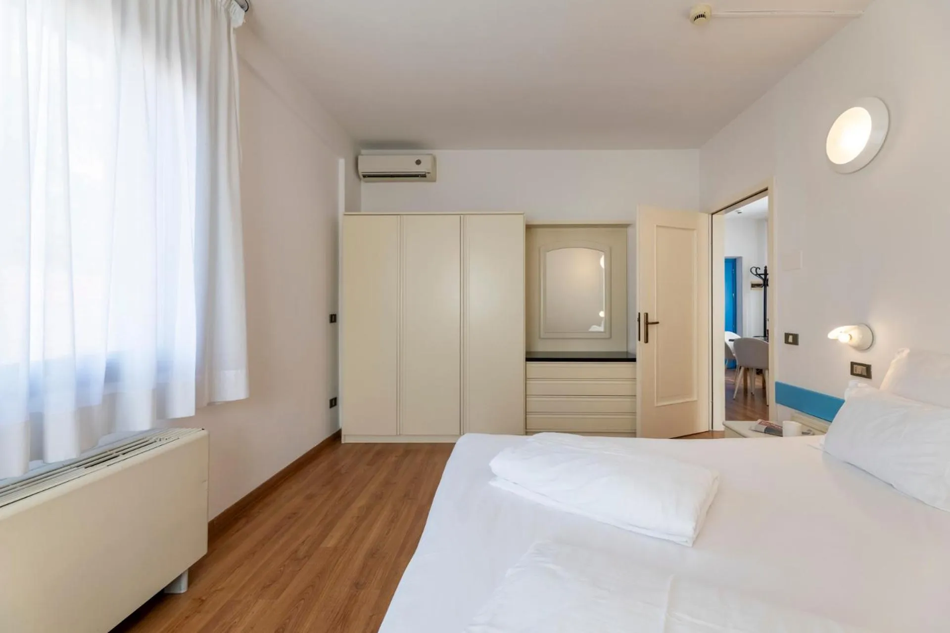 Bedroom, Bed in Hi Hotels Riva del Garda