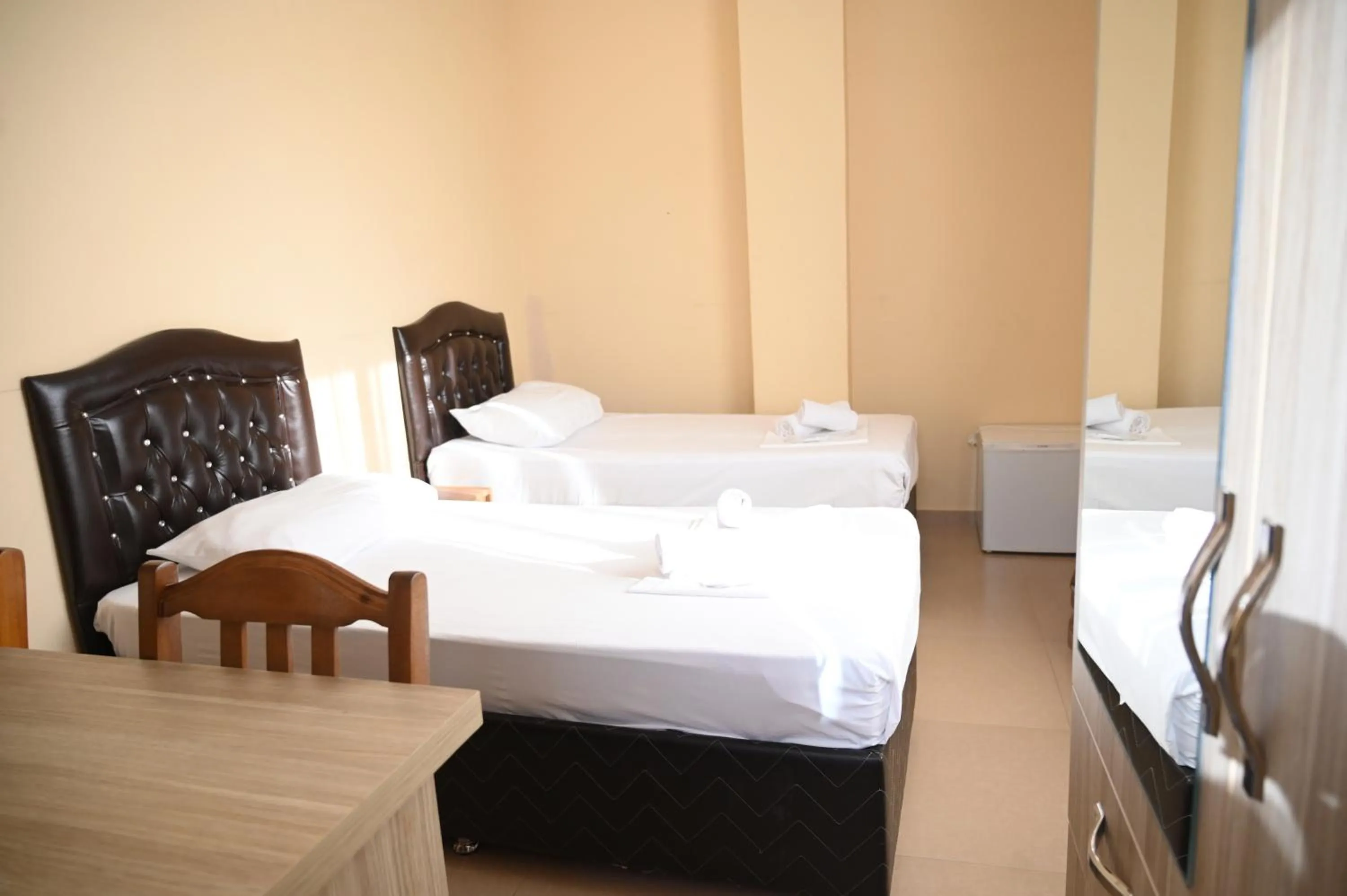 Bed in Hotel Golden House