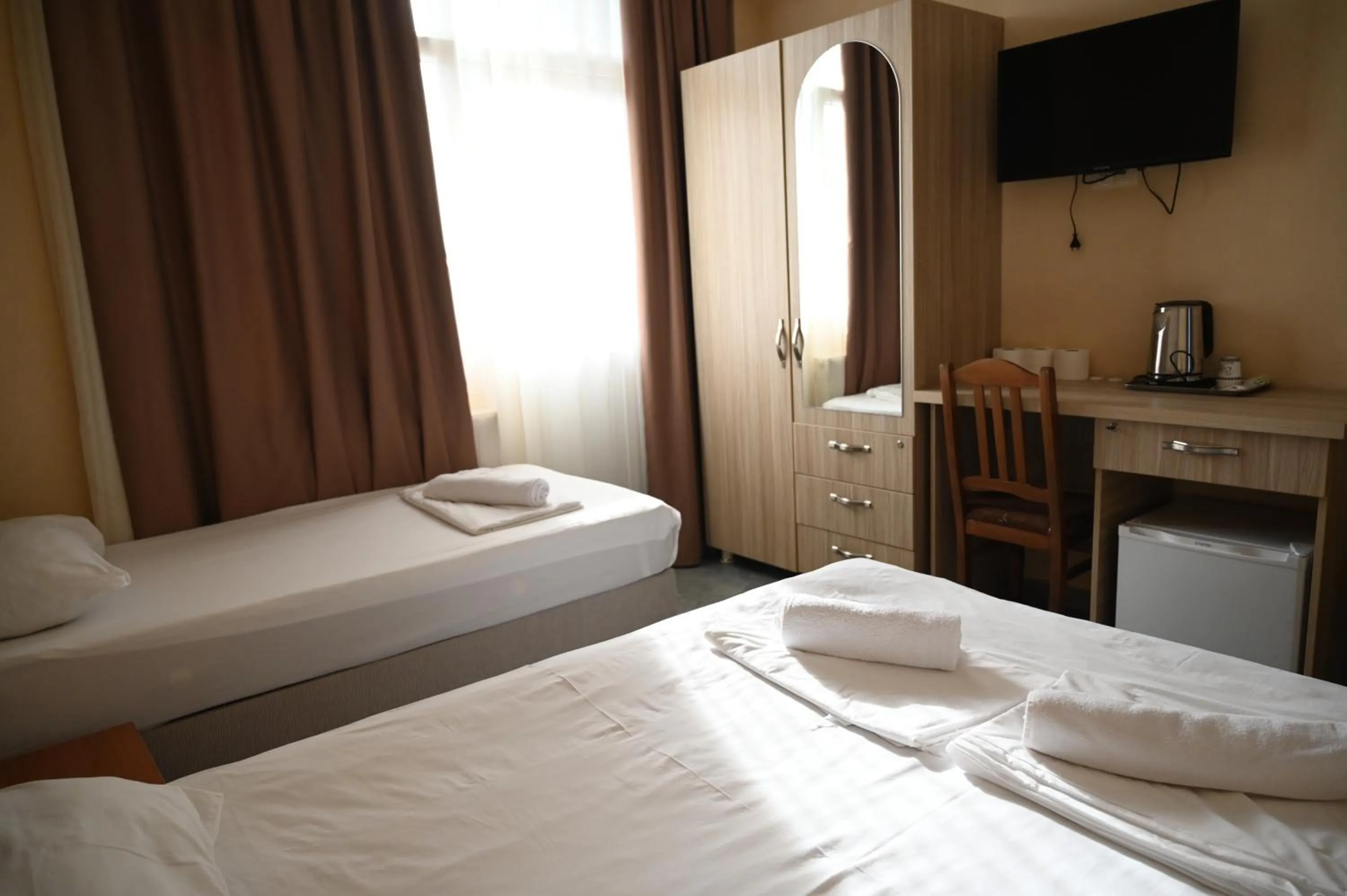 Bed in Hotel Golden House