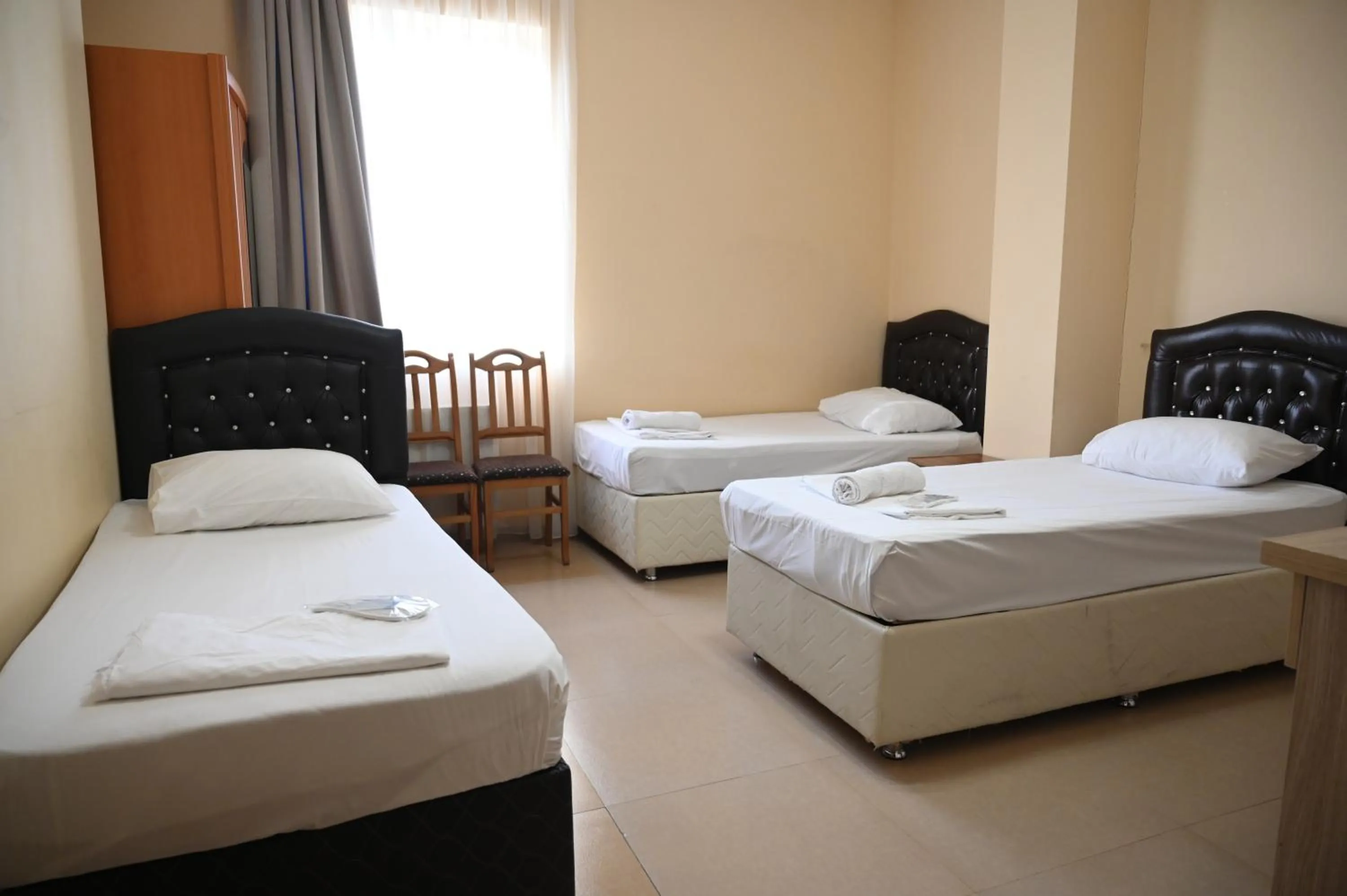 Bed in Hotel Golden House