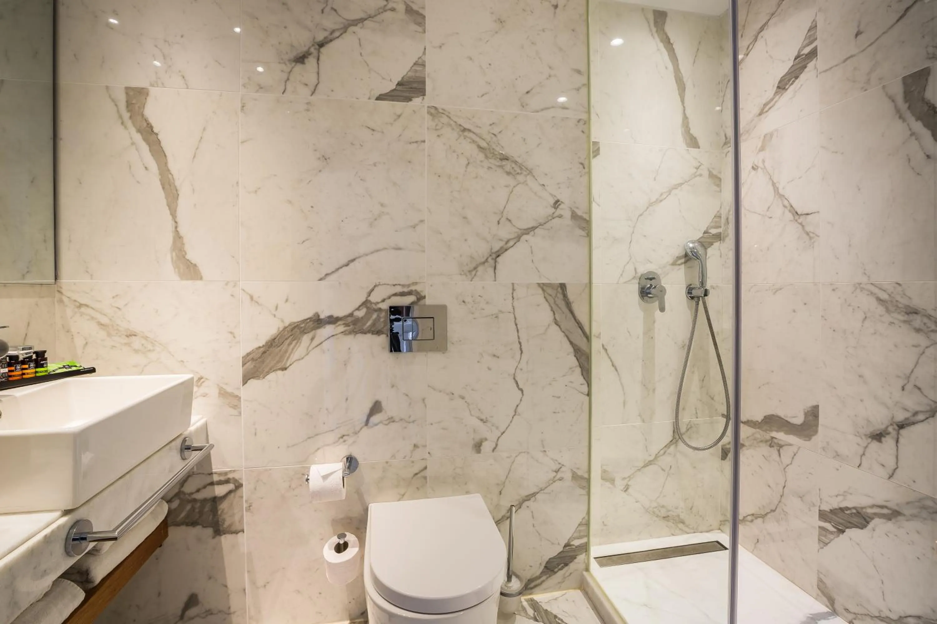 Bathroom in Aenos Hotel