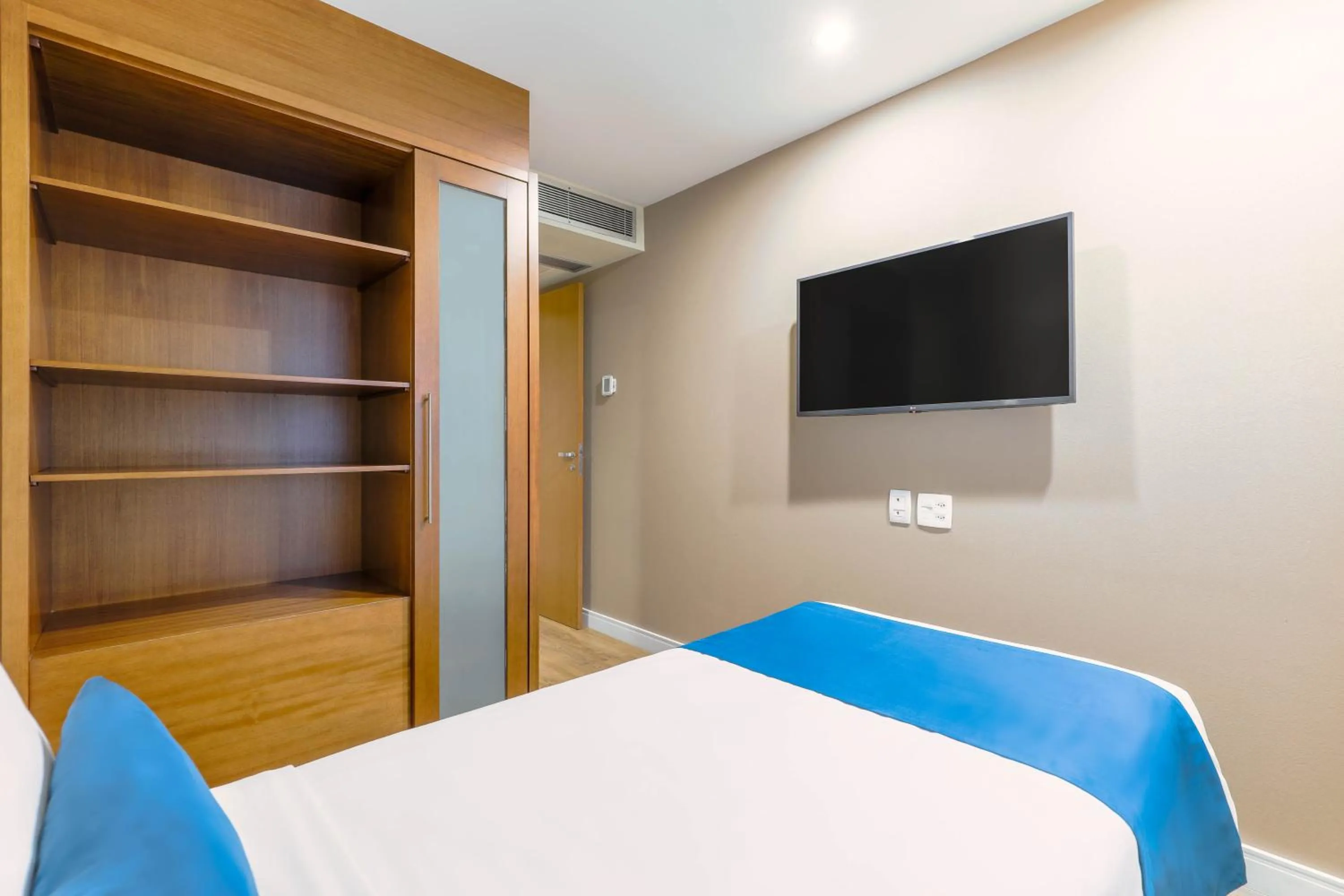 Bed in Wyndham Sao Paulo Ibirapuera Convention Plaza