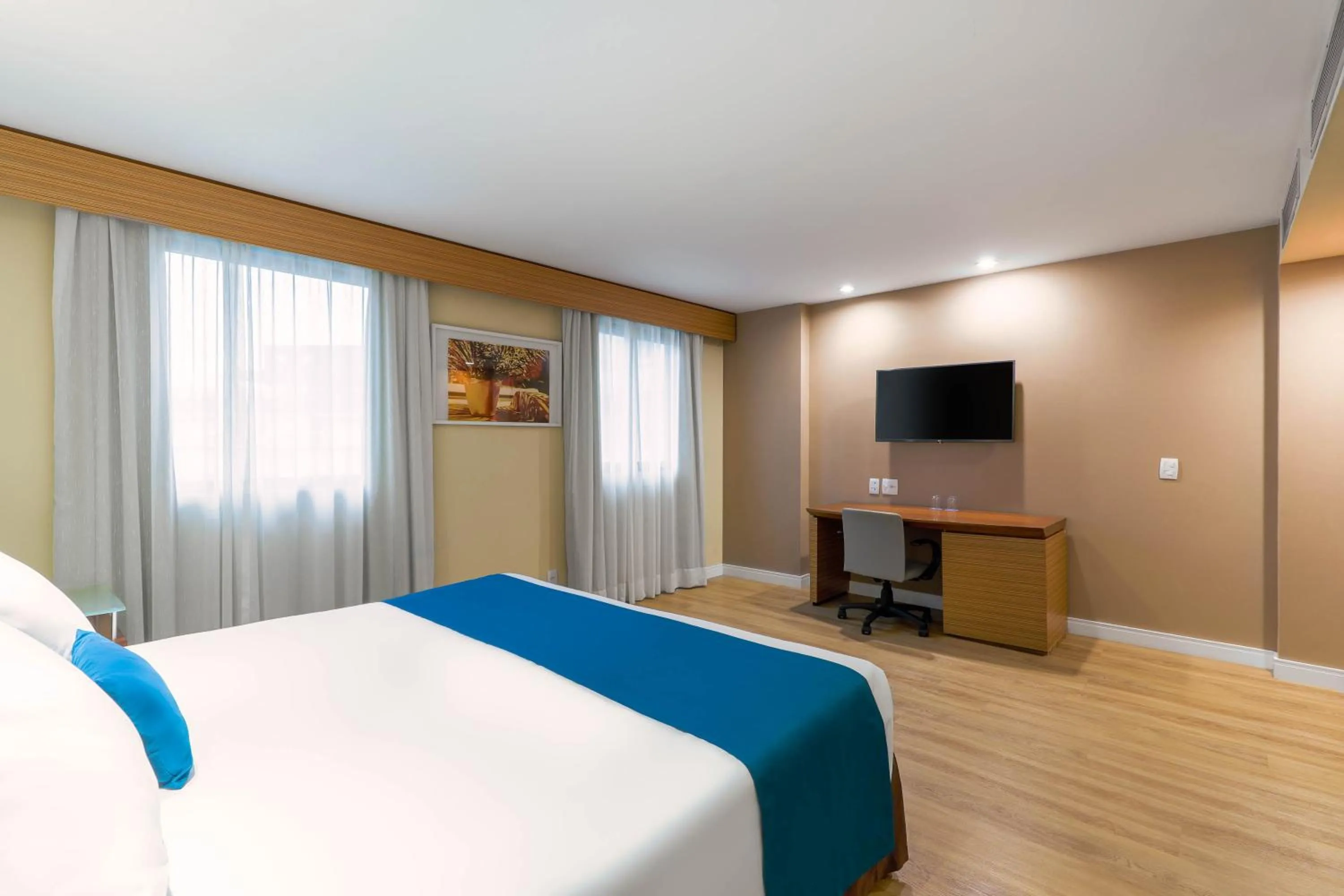 Bed in Wyndham Sao Paulo Ibirapuera Convention Plaza