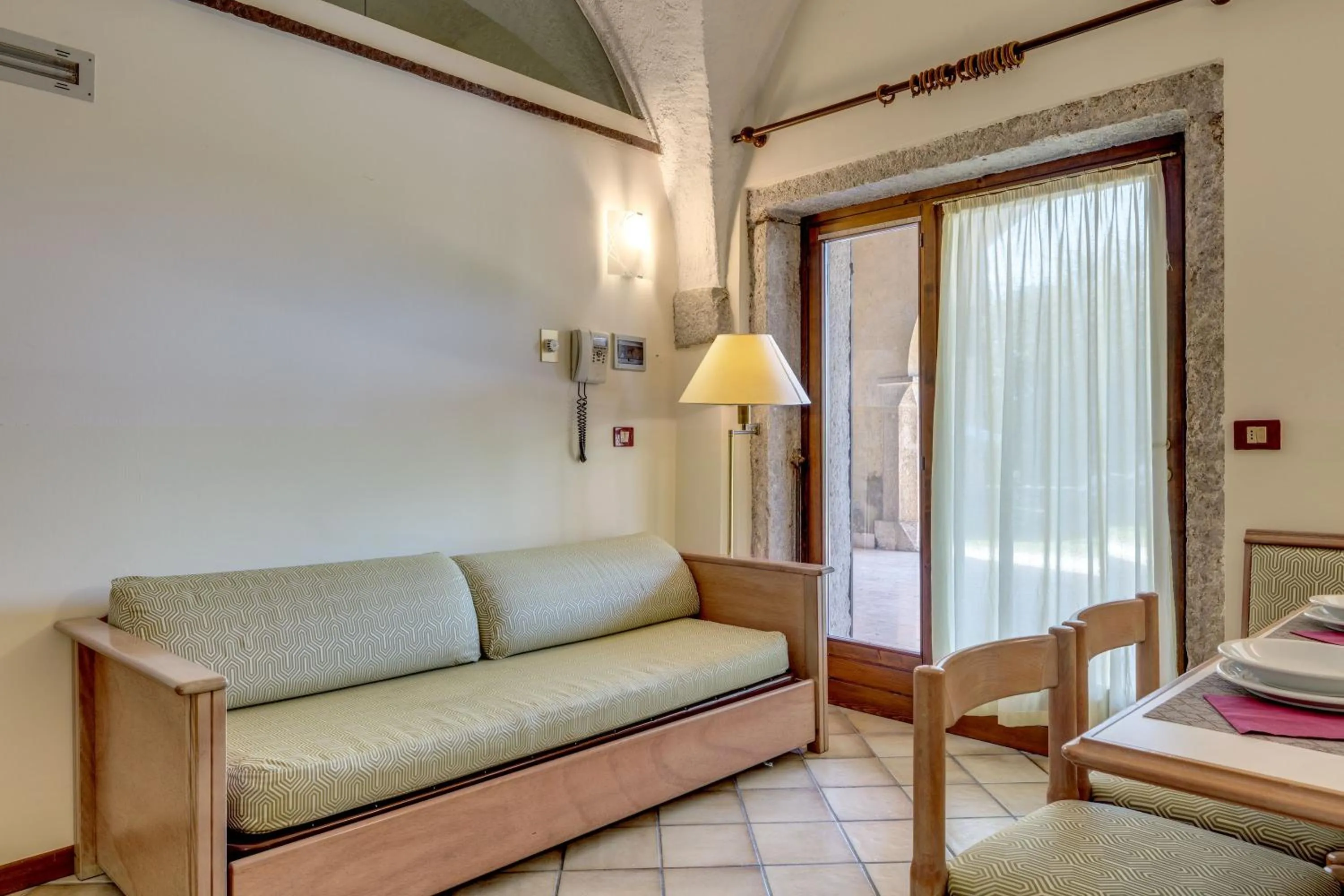 Living room, Bed in Residence La Filanda